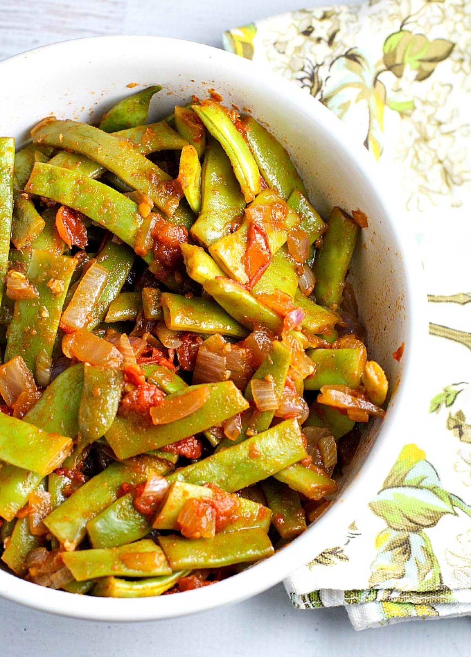 <p><strong><span>Romano beans, also known as Italian flat beans are infused with subtle yet delicious Middle Eastern flavors in <a href="https://www.adishofdailylife.com/2016/08/romano-beans-tomatoes-middle-eastern/" rel="noopener">this straightforward recipe.</a> Once you've got your aromatics going, you add the beans and simmer them with tomatoes and water, then add spices and season to taste. </span></strong></p>