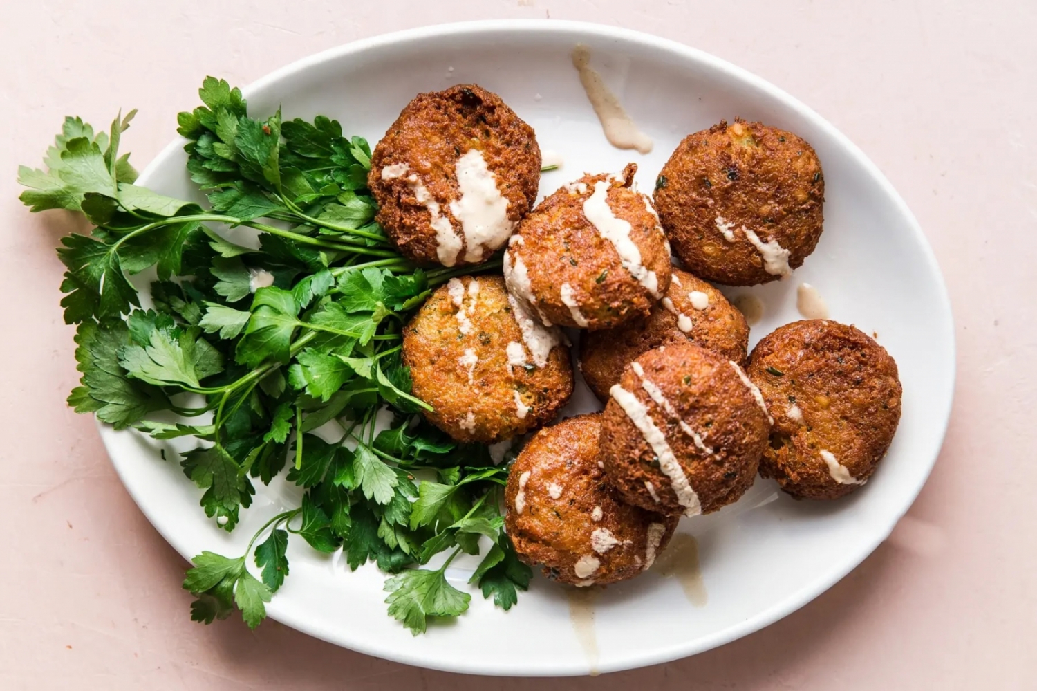 <p>Although it's recommended to use dried chickpeas for homemade falafel, <a href="https://themodernproper.com/falafel" rel="noopener">this recipe</a> proves that canned ones can still get the job done. Wonderfully flavorful and crispy, they come together in no time and will satisfy your cravings for this Middle Eastern delight every time.</p>