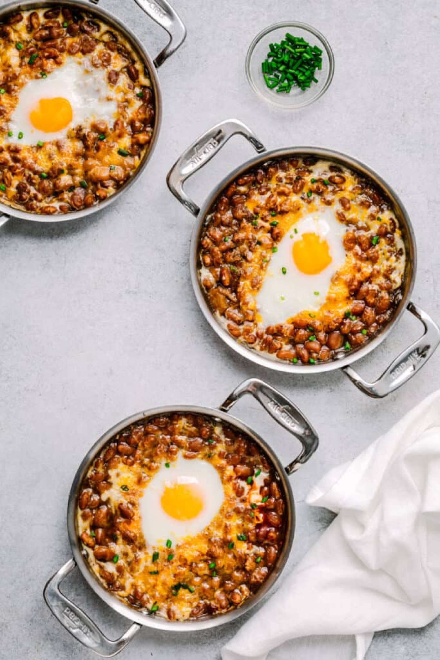 <p>Turn a can of baked beans into your main dish with <a href="https://poshjournal.com/egg-and-baked-beans" rel="noopener">this incredibly easy 4-ingredient recipe</a> that's good for breakfast, lunch or dinner! It calls for spicy Louisiana hot sauce, but feel free to swap in whichever one you have on hand.</p>