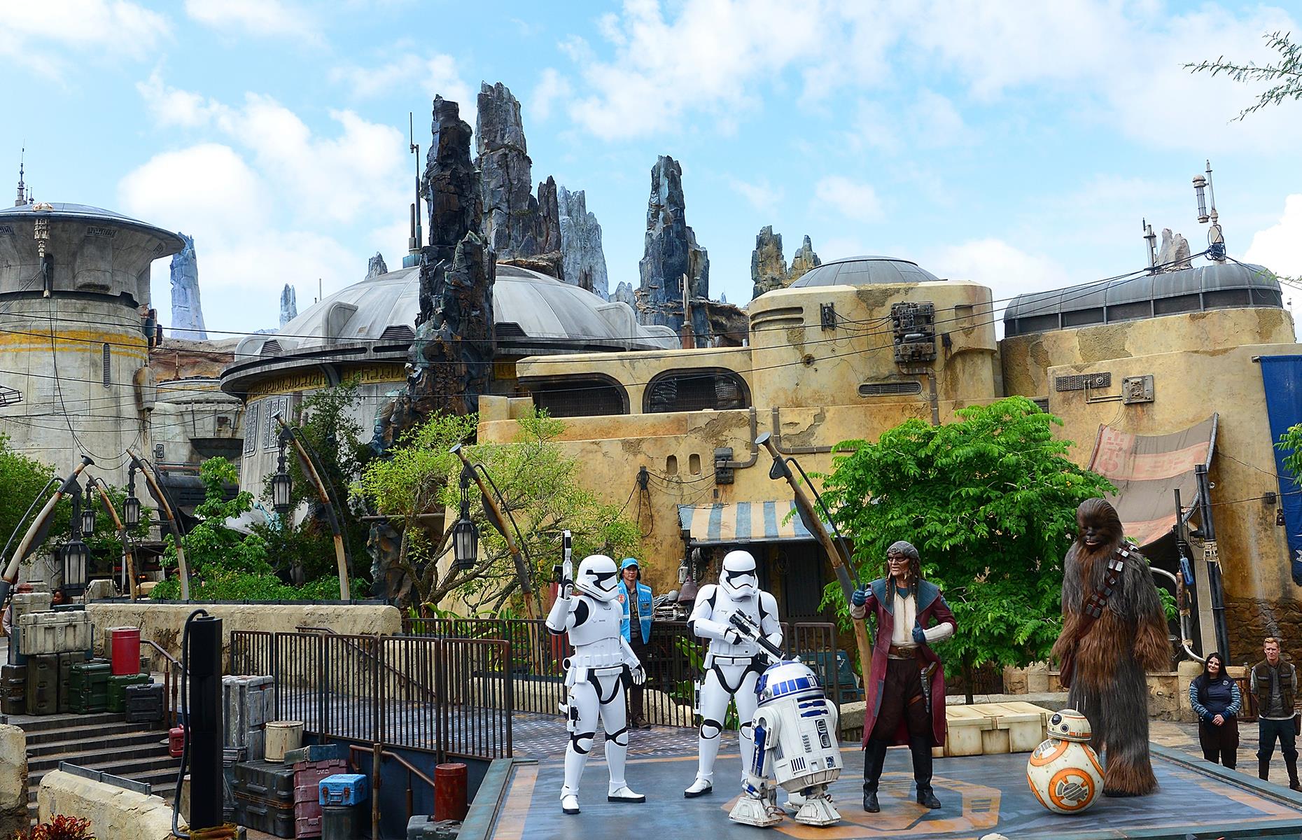 Fans of a galaxy far, far away rejoiced as Star Wars: Galaxy’s Edge – a land entirely dedicated to the celebrated sci-fi franchise – debuted at Florida's Walt Disney World Resort in the summer of 2019. This snap shows the attraction's dedication on 28 August, before its grand public opening the next day. Chewbacca and R2D2 join in the celebrations, with Batuu's Black Spires rising up behind them.