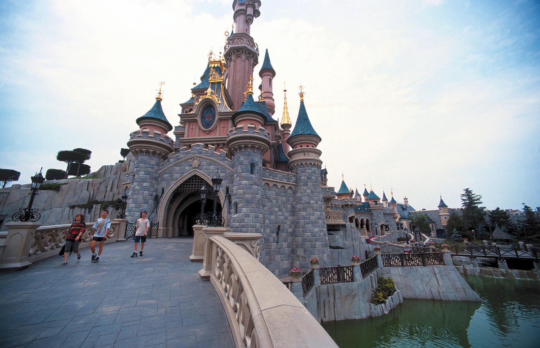 Disneyland Paris went from strength to strength in the Nineties and Noughties and, by 2001, the park had welcomed a whopping 100 million visitors. The landmark Sleeping Beauty Castle (or Le Château de la Belle au Bois Dormant) is pictured here that same year: its pointed turrets, glittering moat and pastel-pink façade love the camera.