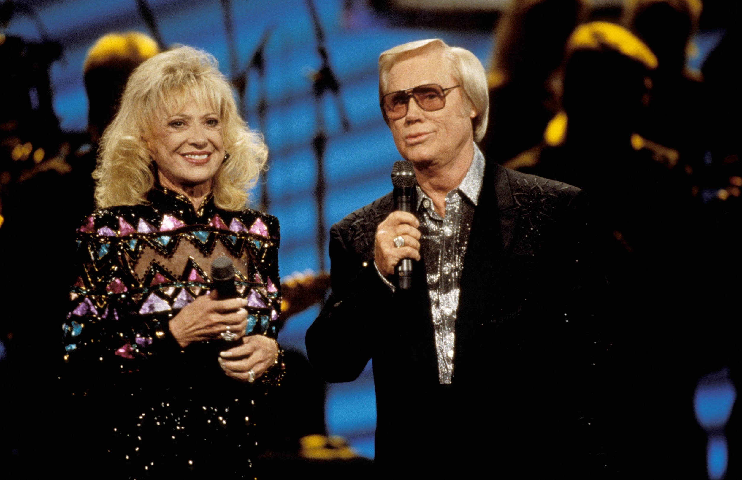<p>This legendary duet between then-couple Tammy Wynette and George Jones was a #1 hit in 1976 and remains one of the genre's finest vocal duets. It also offered a bit of a peek inside the duo's tumultuous marriage, which ended one year prior. </p>