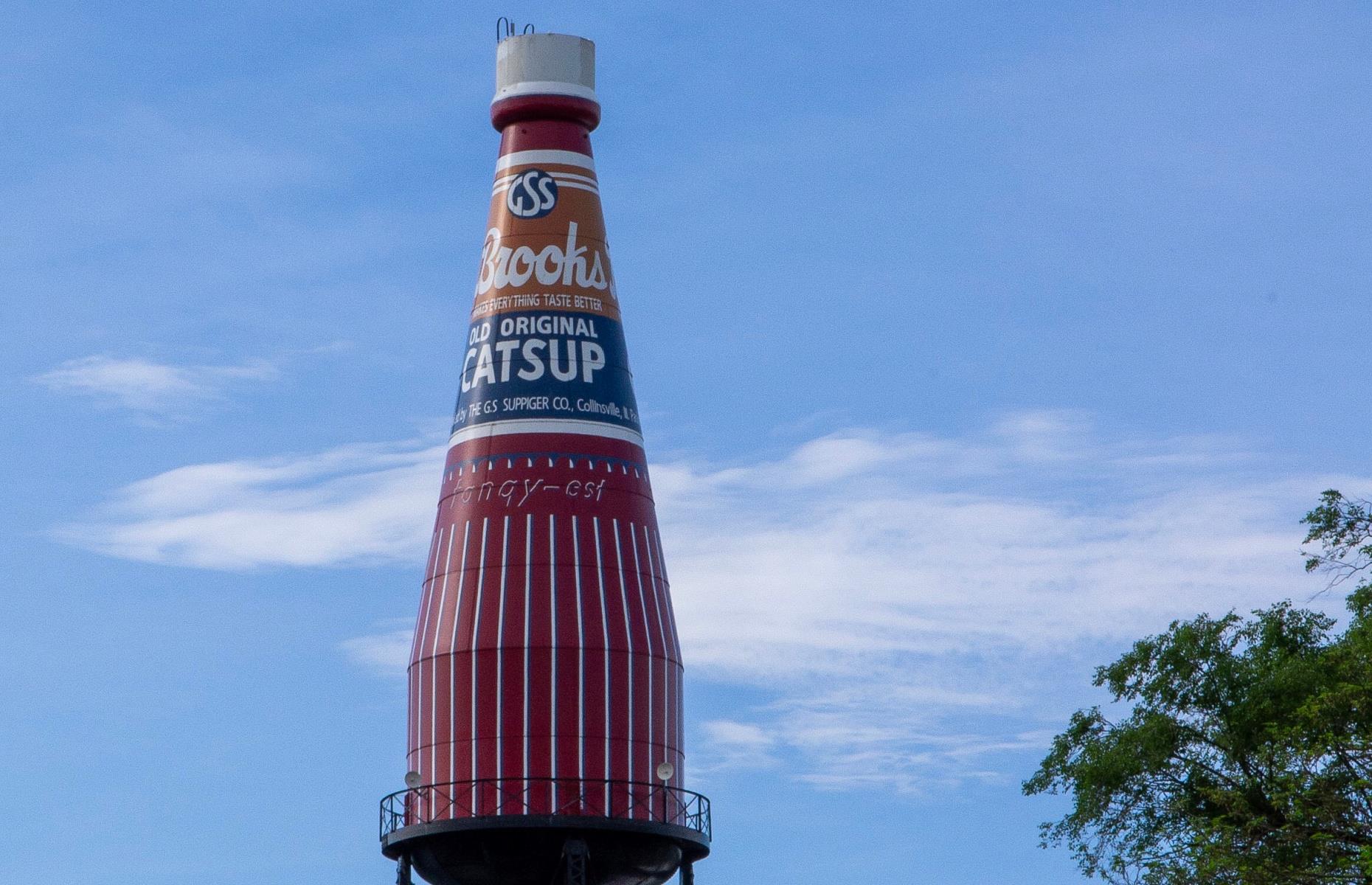 <p>The <a href="https://www.catsupbottle.com/index.html">world’s largest catsup</a> (or ketchup) bottle doesn’t feature a Heinz label, but is a monument to Brooks Catsup, which was originally produced in Collinsville (and is now made in Canada). The tower was built in 1949 to supply water to the Brooks plant. The tower fell into disrepair but was restored in the 1990s and is now considered a premium example of an American roadside attraction. Despite the rumors, it (probably) isn’t actually filled with ketchup.</p>