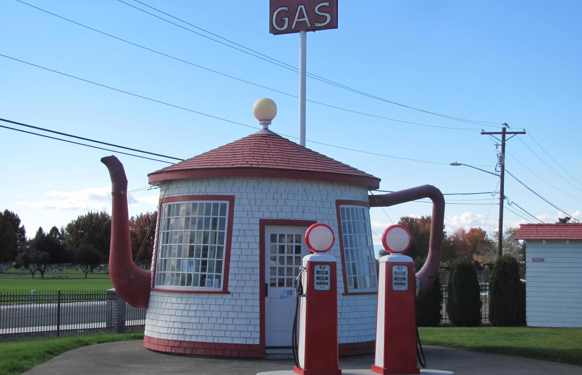 <p>This cute little gas station in Washington isn’t just a perfect example of 1920s novelty architecture, it’s also a joking reference to <a href="https://npgallery.nps.gov/NRHP/GetAsset/4d2ee737-fd0d-4190-8b8e-9c5f57902181">a long-forgotten scandal</a> involving a disgraced politician and an oil field called Teapot Dome. It’s no longer a functional service station, but it's the pride and joy of the town of Zillah, which now owns the refurbished building.  </p>