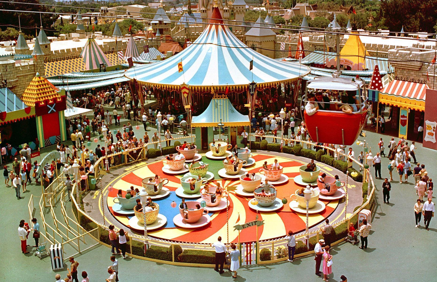 <p>America's love affair with Disney continued into the 1960s and, of course, well beyond. This 1960s photograph shows tourists enjoying one of Fantasyland's whimsical attractions: the spinning teacups of the kaleidoscopic Mad Tea Party ride were inspired by <em>Alice in Wonderland</em>.</p>  <p><strong><a href="https://www.loveexploring.com/galleries/92839/stunning-historic-images-of-theme-parks-in-full-swing?page=1">Here are more historic images of theme parks in full swing</a></strong></p>