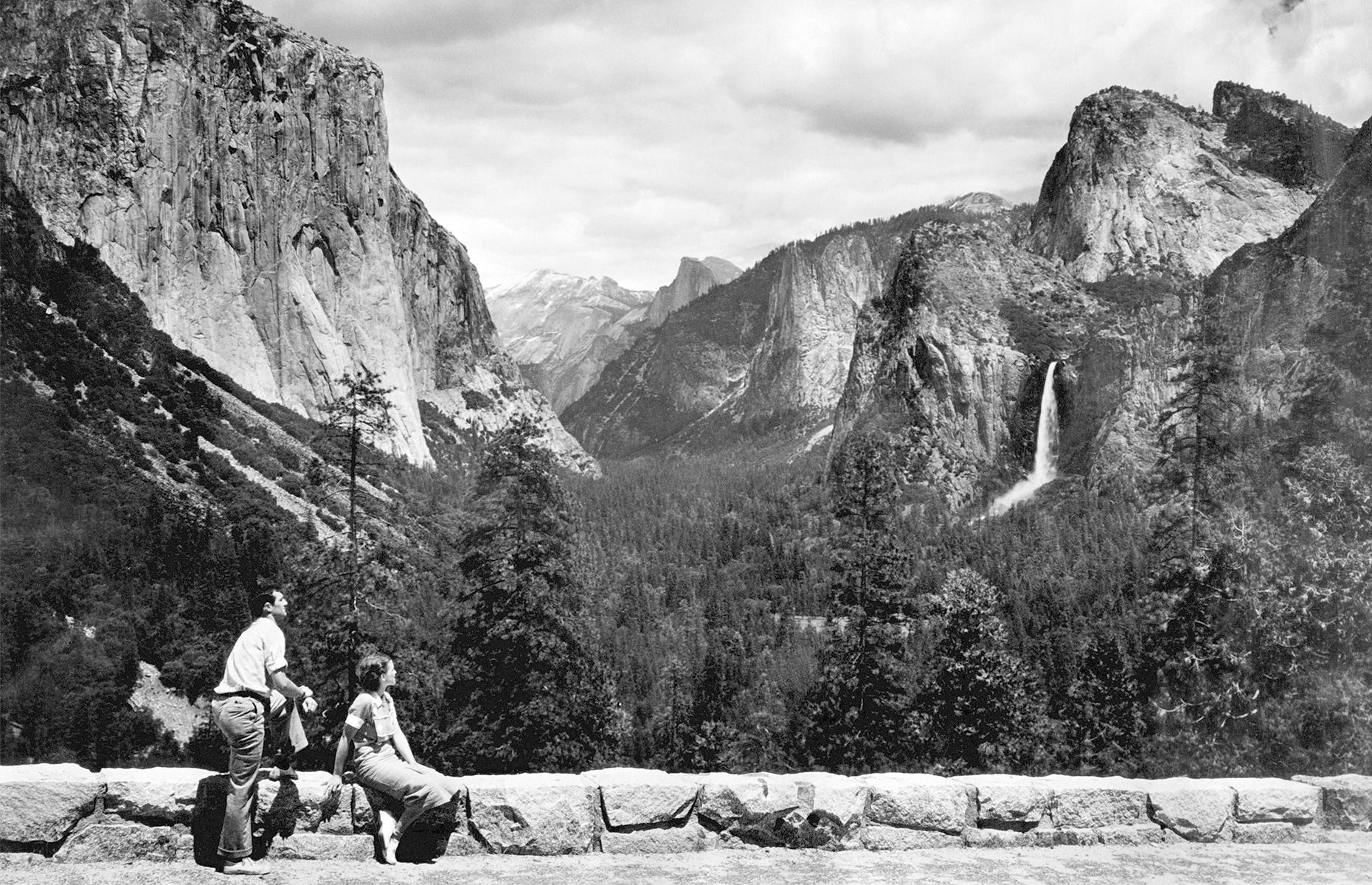 <p>This nostalgic photograph snaps another pair of national park road-trippers. Taken in 1938, it captures a young couple off California State Route 41 in Yosemite National Park. The 620-foot (189m) Bridalveil Fall thunders down in the background. </p>  <p><a href="https://www.loveexploring.com/galleries/94956/what-family-holidays-looked-like-the-decade-you-were-born?page=1"><strong>Now see what family vacations looked like the decade you were born</strong></a></p>