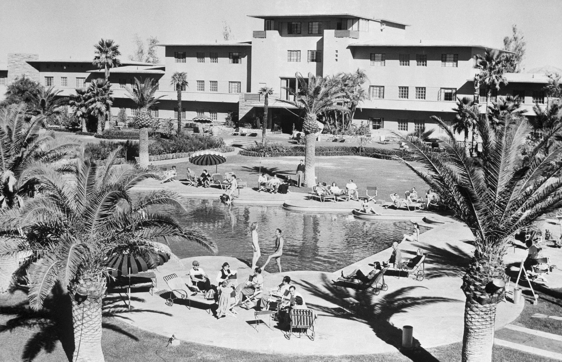 <p>The legendary Flamingo Las Vegas (still in operation) was one of the ritzy hotels to open during this period. Then tipped as a "playground of the elite", the hotel boasted a palm-dotted patio, a vast pool and plush accommodations. This aerial shot was taken in 1949 and sees glamorous vacationers sun themselves beside the water. </p>  <p><strong><a href="https://www.loveexploring.com/galleries/99342/sin-city-secrets-the-incredible-story-of-las-vegas?page=1">Read more Sin City secrets here</a></strong></p>