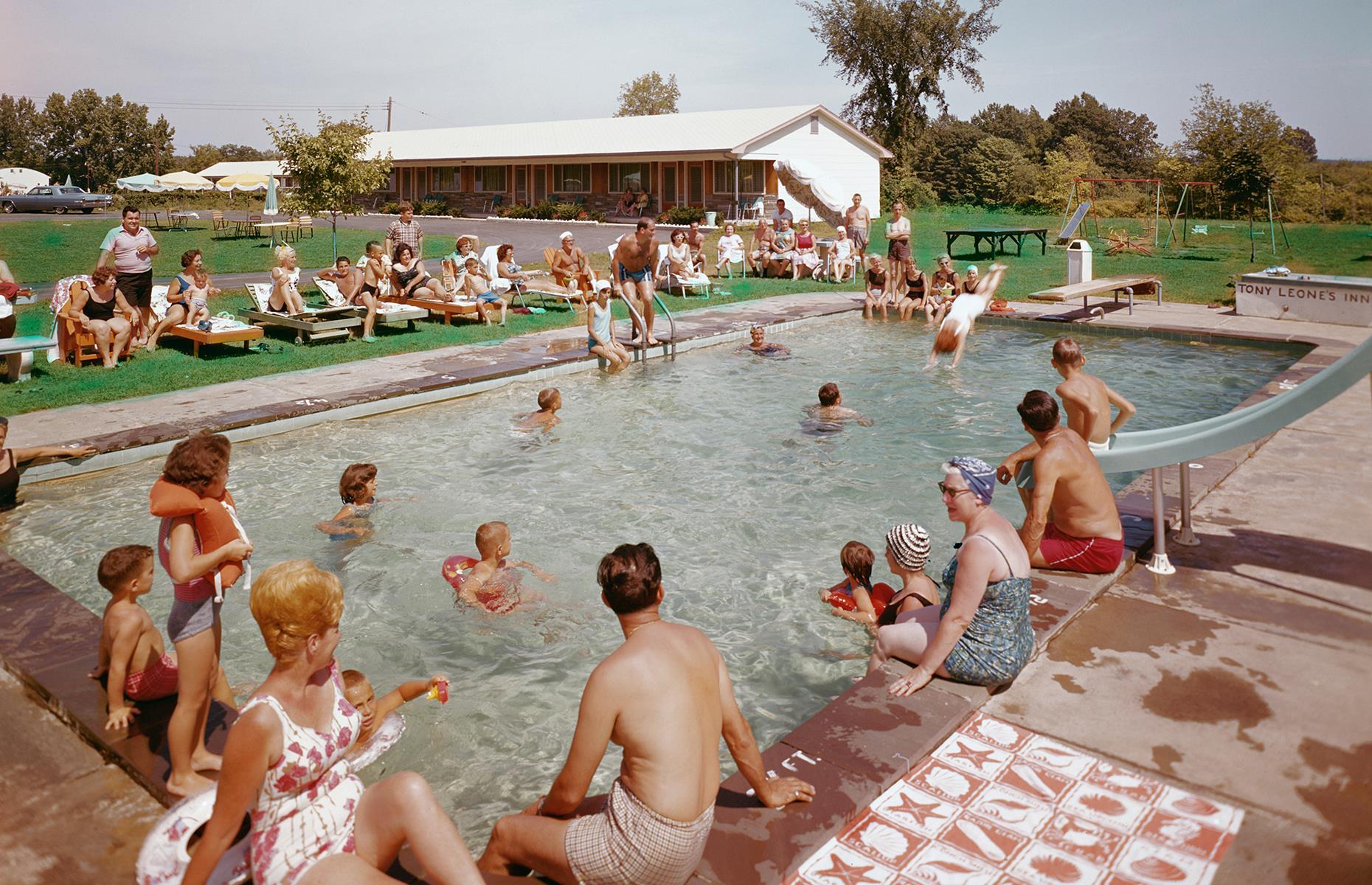 <p>By the 1960s, even more resorts had mushroomed in this beautiful area of New York state. In this 1960s shot, families enjoy a more laid-back, family-friendly vacation spot named Tony Leone's Resort, which came complete with a slide, swings and picnic benches. </p>  <p><strong><a href="http://bit.ly/3roL4wv">Love this? Follow our Facebook page for more travel inspiration</a></strong></p>