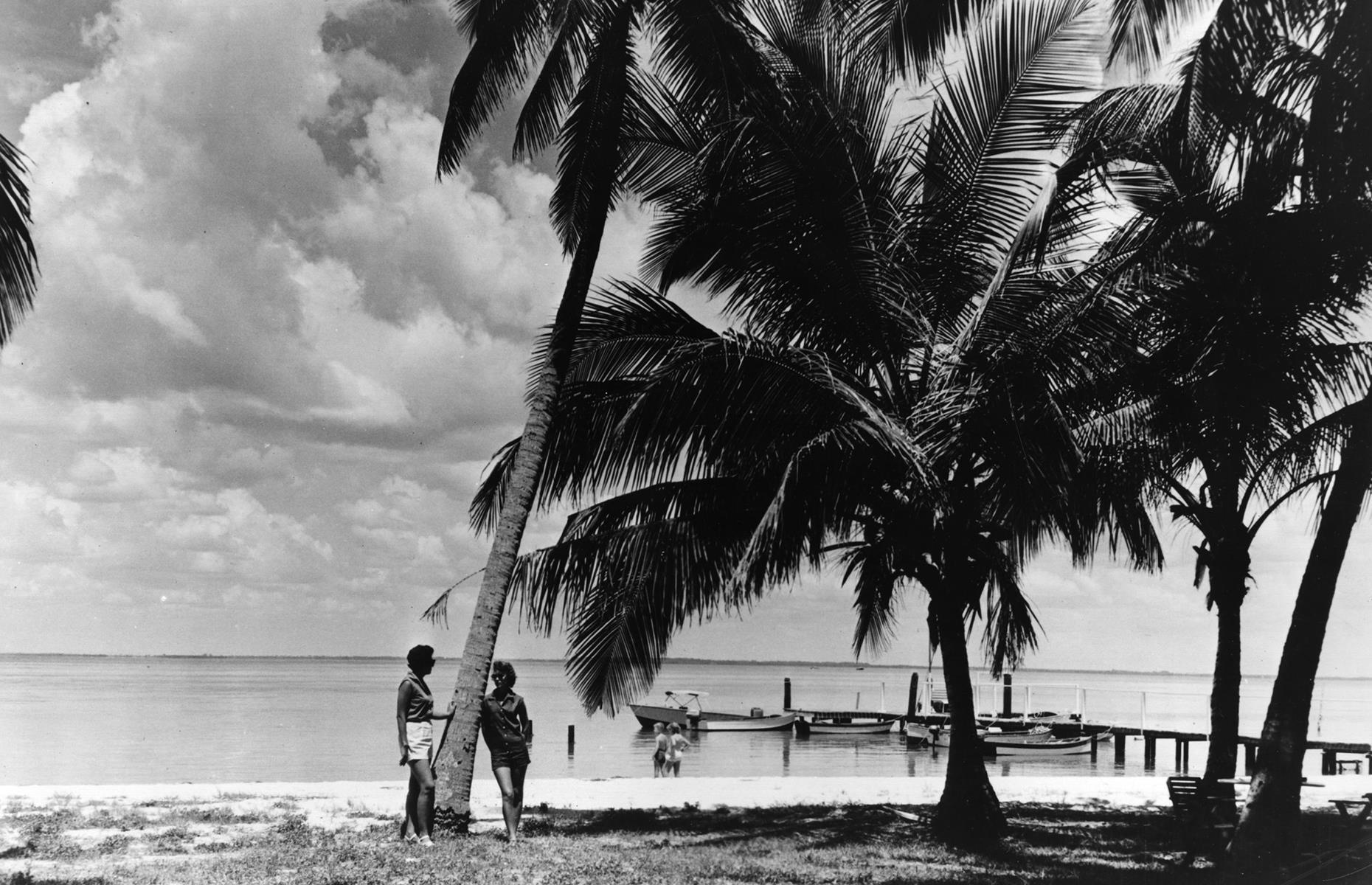 Beyond the buzz of Miami, Florida had plenty of quieter tourist spots too. Destinations such as Sanibel Island, a Floridian barrier island that juts into the Gulf of Mexico, offered a more sedate escape through the 1950s and beyond. A couple enjoy the shade of a palm tree in this 1955 photo taken on a Sanibel Island strand.