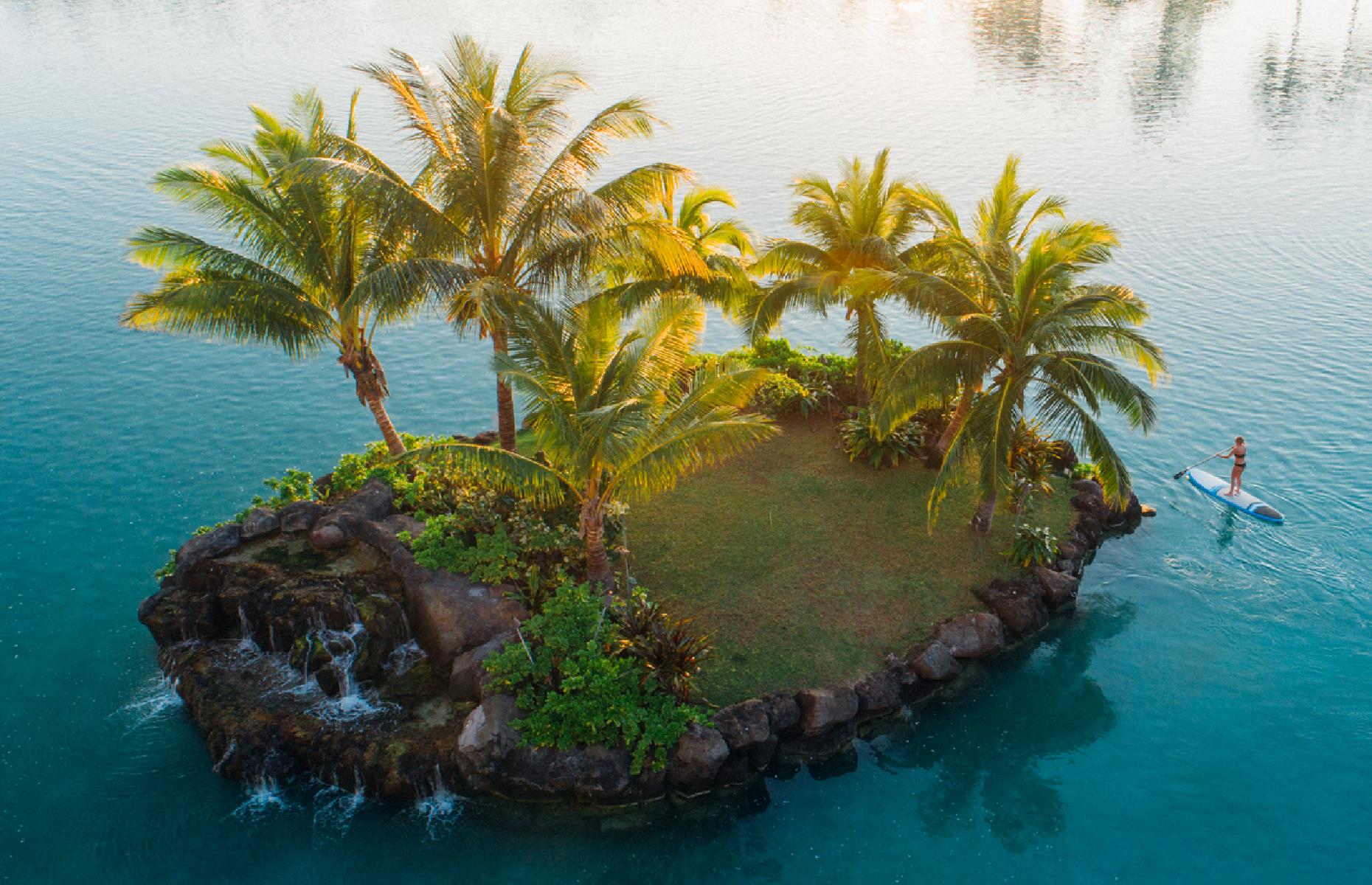 This tree-topped island looks super remote, but it actually floats within a man-made pool in the buzzy Honolulu neighborhood of Waikiki. The Duke Kahanamoku Lagoon, fringed by yellow sands and flanked by hotels, is the perfect city spot for stand-up paddle boarding, kayaking and swimming.
