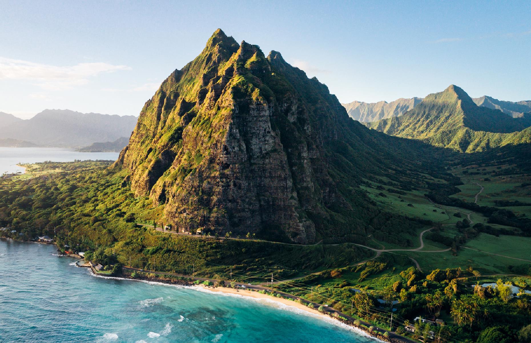 <p>If you're craving a retreat from southern Oahu's buzzier beaches, strike north-east to the Windward Coast and the lush Kualoa Ranch. This private nature reserve is carved up into two distinct sections: the south, home to the Hakipuʻu Valley rainforest, and the north (pictured), boasting the emerald Kaʻaʻawa Valley. The latter is nicknamed “Jurassic Valley” and features in several films in the <em>Jurassic Park</em> franchise. </p>  <p><a href="http://bit.ly/3roL4wv"><strong>Love this? Follow our Facebook page for more travel inspiration</strong></a></p>