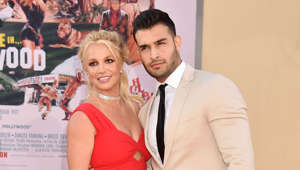 a man and a woman posing for a picture: The Princess of Pop got together with her boyfriend Sam Asghari back in 2016, during the production of the music video for her song 'Slumber Party'.   The 39-year-old singer has been spotted having many cute moments with her 12-year younger partner, who has also supported her throughout the battle for the end of her conservatorship.  She once wrote on Instagram: “Everyday he inspires me to be a better person and that makes me feel like the luckiest girl in the world."