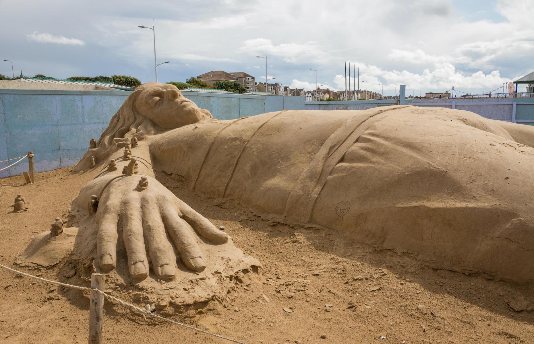 <p>Around 5,000 tons of beach sand were used by 20 international artists who gathered at the Somerset beach to create sculptures based around a theme of Once Upon a Time at the 2014 Weston-super-Mare Sand Sculpture Festival. Pictured here is a giant Gulliver and the Lilliputians from Jonathan Swift’s <em>Gulliver’s Travels</em> – it was one of the largest displays at the festival and was the work of Radovan Zivny from the Czech Republic.</p>