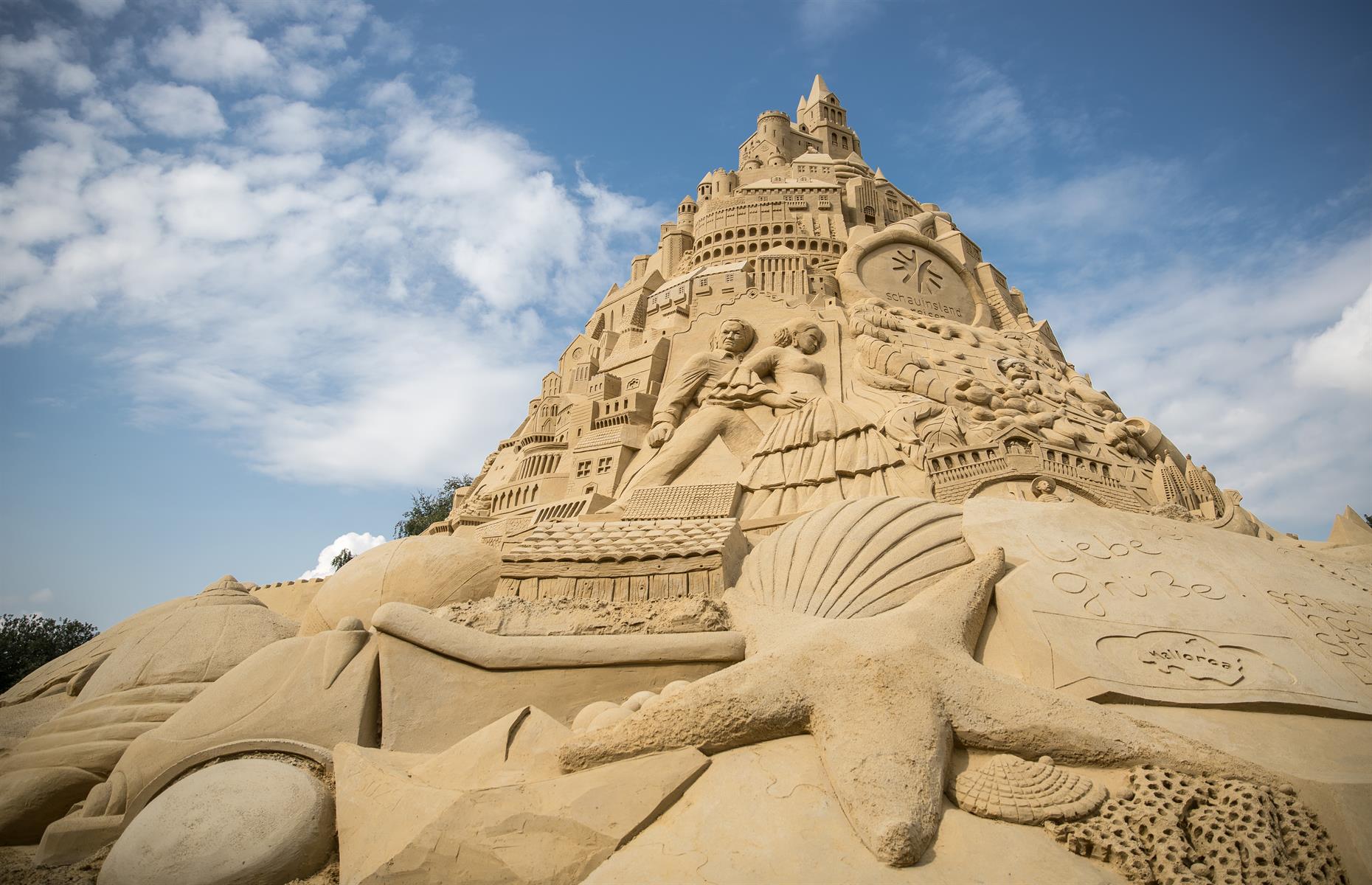 <p>Most years, serious sandcastle builders battle it out to create the tallest sandcastle in the world and make it into the <em>Guinness Book of World Records</em>. This mighty monument was constructed in Duisburg, in Germany's Rhineland region in 2017 and beat the previous world record by six feet (1.84m). The soaring Sandburg, which was commissioned by a local travel agency, took 19 artists three weeks to build and was made from 3,500 tons of sand. It was 55 feet (17m) high.</p>