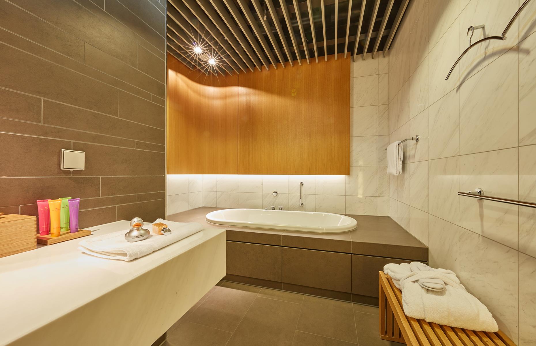<p>There are nap rooms where you can snooze on a proper bed with white sheets and a pillow, plus fantastic bathrooms where you can have a soak and enjoy some of the luxury toiletries.</p>