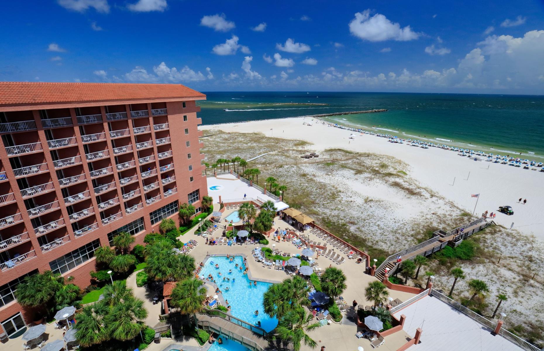 <p>Alabama can only claim a small slice of the Gulf Coast, but the area around Orange Beach and Gulf Shores boasts unexpectedly beautiful white sand beaches. The area is full of tall hotels with suite-style rooms that can accommodate both large and small groups, including <a href="https://www.perdidobeachresort.com">this well-appointed resort</a> right on sandy Orange Beach. In addition to close proximity to the beach, the resort has five dining options, indoor and outdoor pools, and opportunities for watersports and sailing tours.</p>