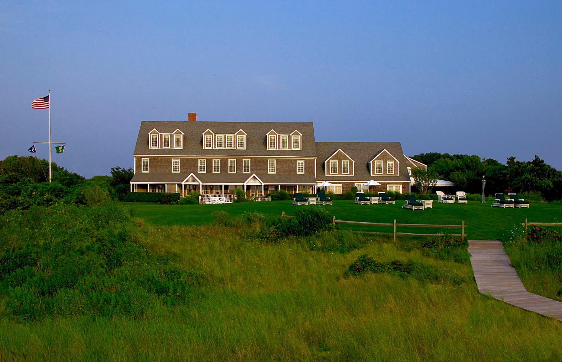 <p>The charm and beauty of Nantucket Island is best experienced at a classic New England waterfront hotel like <a href="https://www.wauwinet.com">The Wauwinet</a>. The spacious rooms in calming shades of white and pale blue get guests in the mood for a serene getaway. There are plenty of ways to while away the day here – a walk on the private beaches, a cycle using complimentary bikes or watersports in summer. For a true treat, visitors can rent out Anchorage House, a quaint Nantucket guesthouse managed by The Wauwinet.</p>