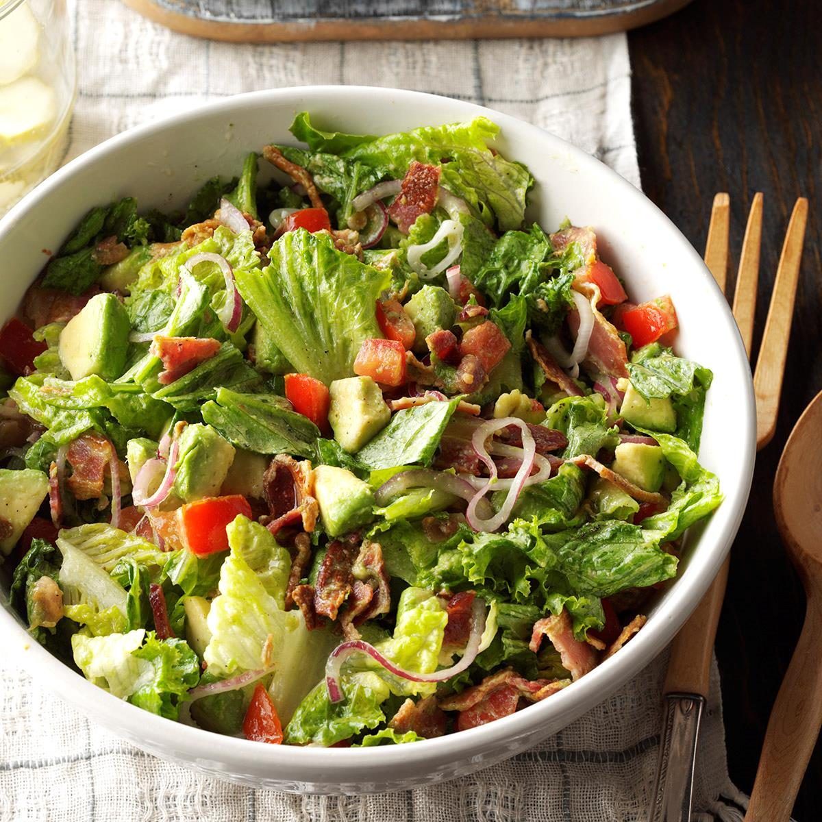 <p>The fresh blend of avocados, tomatoes, red onion and greens in my salad gets additional pizazz from crumbled bacon and a slightly spicy vinaigrette. —Lori Fischer, Chino Hills, California</p> <div class="listicle-page__buttons"> <div class="listicle-page__cta-button"><a href='https://www.tasteofhome.com/recipes/guacamole-tossed-salad/'>Go to Recipe</a></div> </div>
