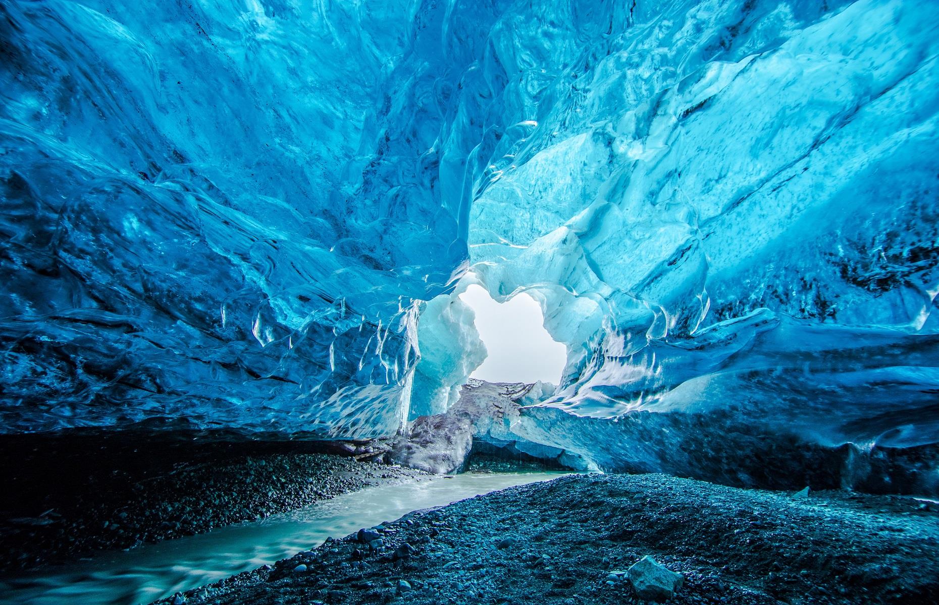 <p>There are plenty of things you can do in Iceland that you can't do anywhere else on Earth and stepping inside the Crystal Ice Cave is one of them. Also known as Breiðamerkurjökull Cave, this southern Iceland treasure can be found inside Vatnajökull Glacier, the largest and most voluminous ice cap in the country. The natural cave dates back around 1,200 years and was formed thanks to the weight of the ice pressing out oxygen. Mesmerizing and miraculous in equal measure, this awe-inspiring icy wonder is unmissable.</p>
