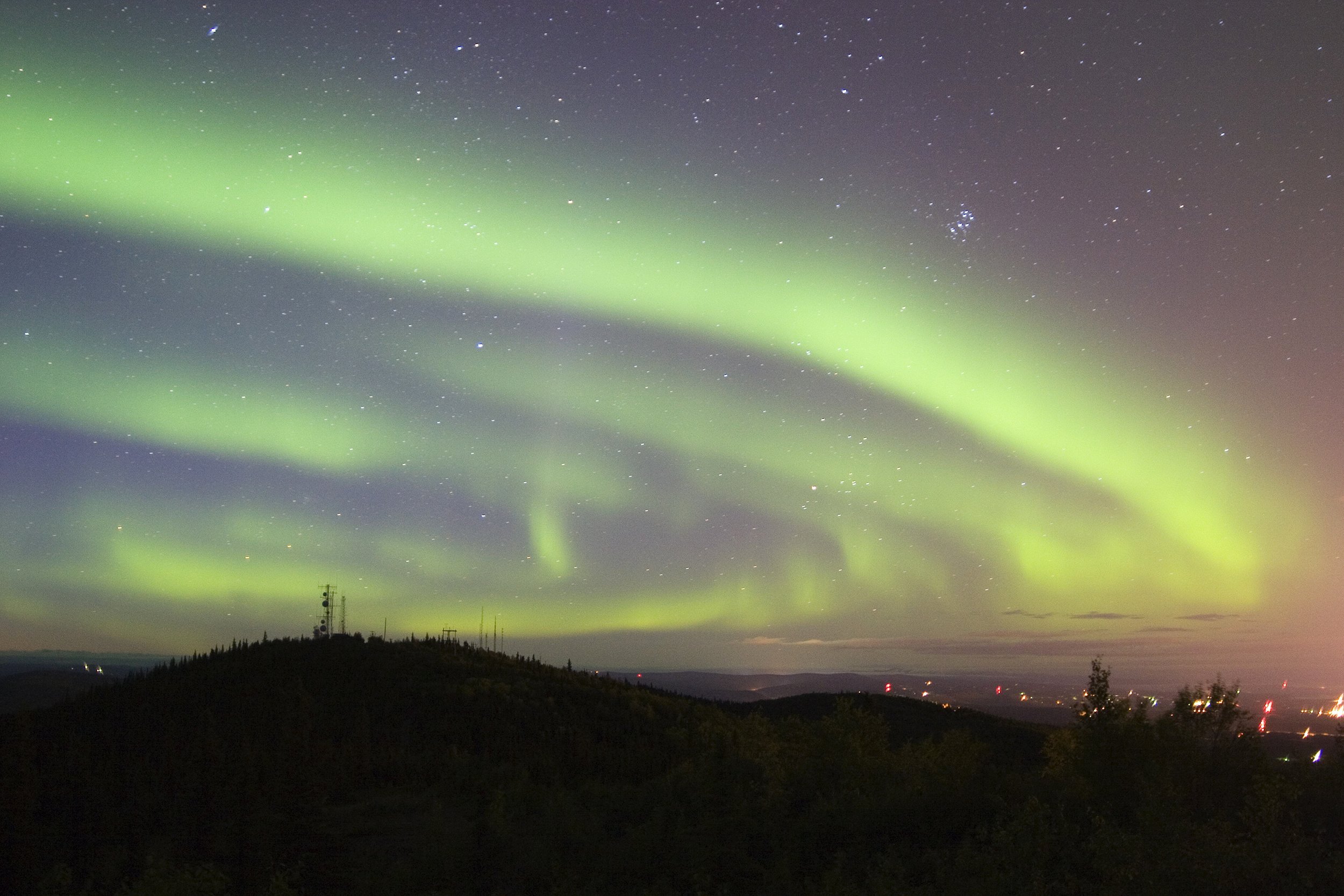 <p>Fairbanks is only 198 miles from the Arctic Circle in the auroral oval, making this cold city a hot spot for travelers who want to see the <a href="https://www.cheapism.com/blog/how-see-northern-lights-cheap-3850/">Northern Lights</a>. City officials recommend at least a three-day stay in fall, winter, or early spring for an 80% chance of successful viewing. Area hotels offer Northern Lights wakeup calls, but visitors can also opt for a more quintessentially Alaskan experience, such as a cabin stay or sled-dog trip.</p>