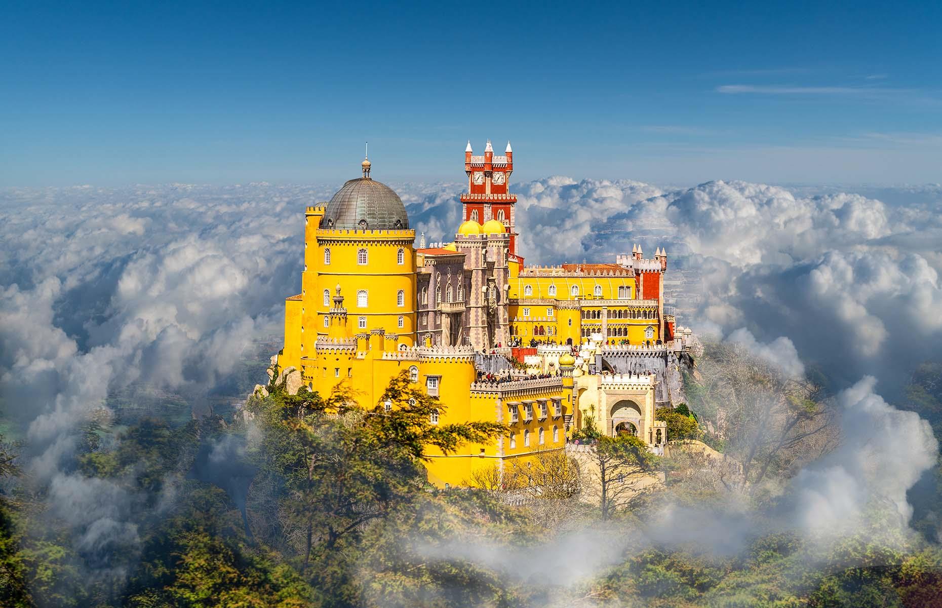 <p>It might be called a palace, but Pena Palace is in fact a castle, and few are so heart-flutteringly pretty. Its butter-yellow turrets and brick-red towers rise above the treetops in hilly Sintra, just outside Lisbon. The multicoloured beauty, an example of 19th-century Romantic architecture, was commissioned by King Ferdinand II and completed in 1854, and has been home to Portuguese royals through the years.</p>  <p><a href="https://www.loveexploring.com/gallerylist/67038/europes-most-beautiful-castles"><strong>These are Europe's most beautiful castles</strong></a></p>