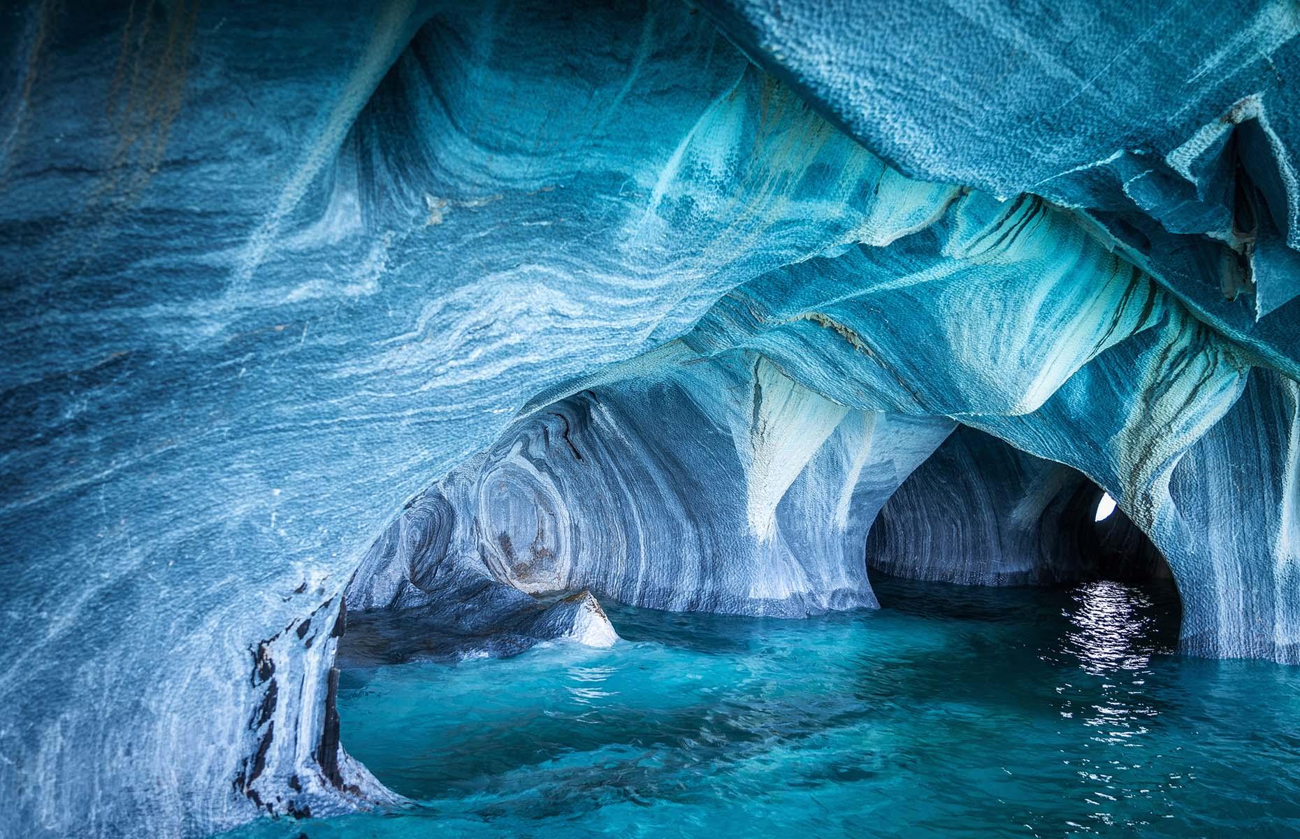 It's easy to see how this remote wonder earned its name. The calcium carbonate caves have been chiseled out by the sea over thousands of years, and the resulting swirls of turquoise, mint and smoky gray look just like marble. Their far-out location on the General Carrera Lake in Patagonia means they've stayed largely untouched and unspoiled.