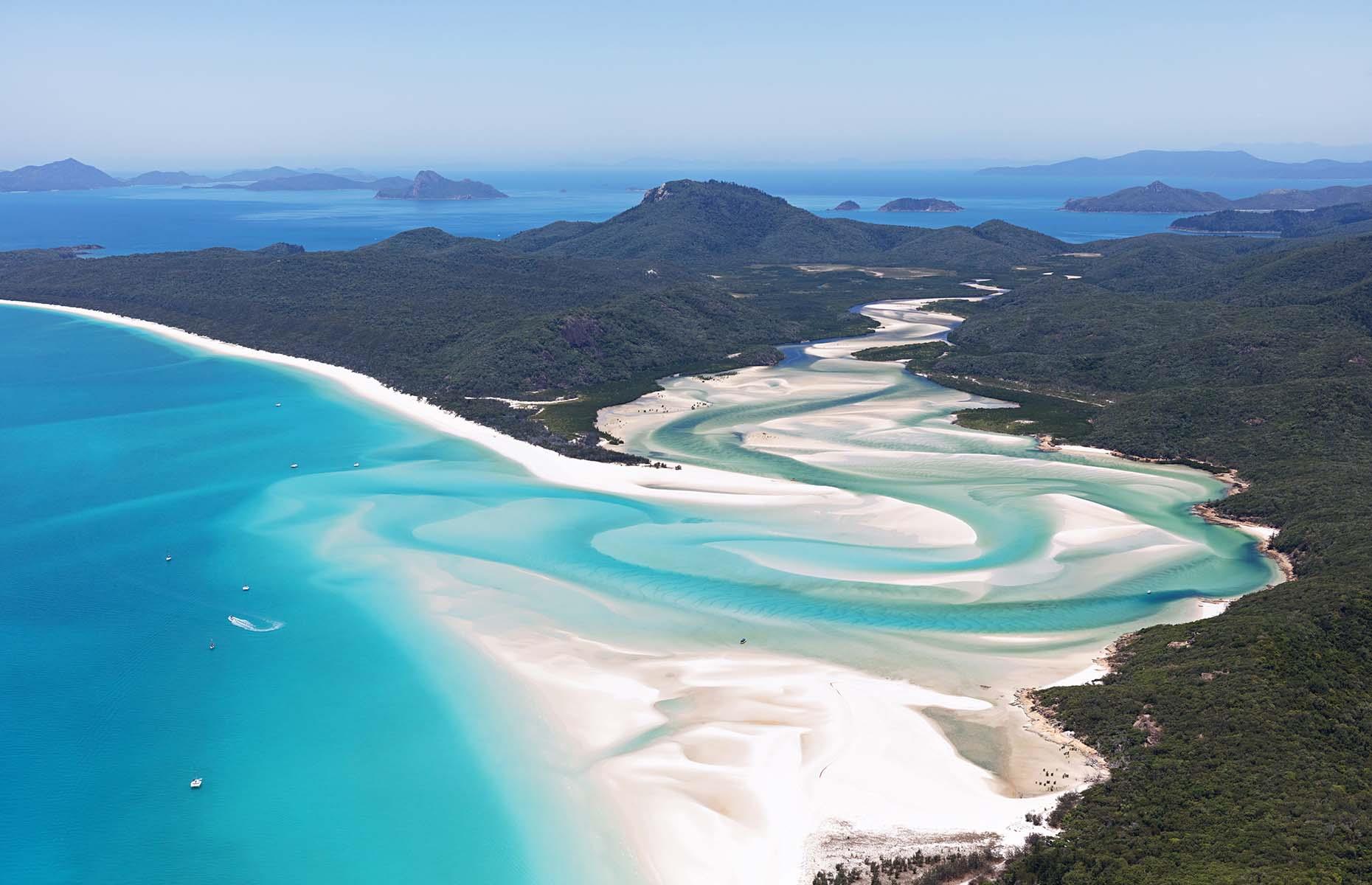 <p>A mesmerising swirl of bright white silica sand and striking azure waters located in the heart of the Great Barrier Reef, the Whitsundays certainly look like paradise on Earth. It’s not hard to see why the 4.3-mile long (7km) Whitehaven Beach, captured from above in this stunning shot, has been showered with awards and typically attracts visitors from all over the world.</p>  <p><a href="https://www.loveexploring.com/galleries/96347/the-worlds-empty-and-beautiful-beaches-from-above"><strong>Take a look at the world's most beautiful beaches from above</strong></a></p>