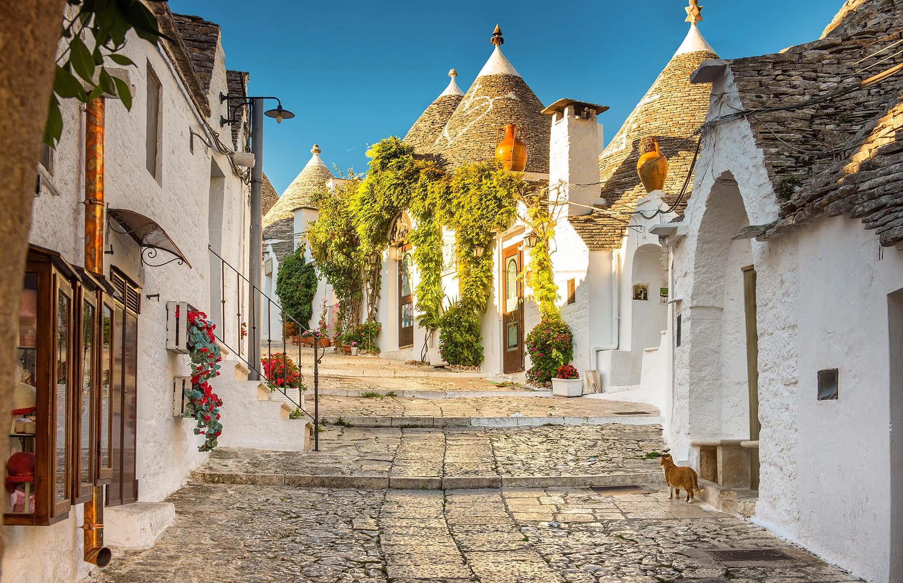 It's almost impossible not to find a picture-perfect street in Alberobello, an UNESCO World Heritage Site in its entirety. The small town in Italy's heel – Puglia – is famous for its unusual trulli homes, built from local whitewashed limestone and with conical roofs. The steps up to Piazza del Popolo reveals stunning views over the higgledy-piggledy town, with thousands of cone-shaped roofs piercing the typically blue sky above.