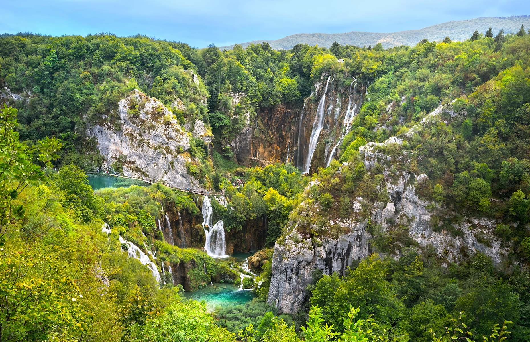 Covering a spectacular expanse of almost 115 square miles (298sq km), Plitvice Lakes National Park in Croatia has been an UNESCO World Heritage Site since 1979. It's celebrated for its 16 striking lakes, which are interconnected by a series of dramatic waterfalls that cascade down into a picturesque limestone canyon. The surrounding woodlands are renowned for their wildlife, including bears and wolves.