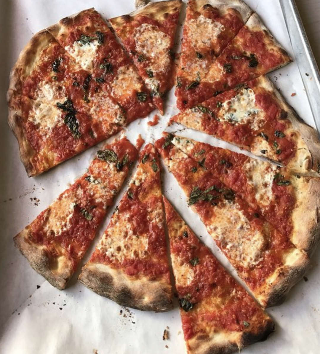 <p><b>Region</b><b>: </b>Connecticut, Massachusetts, Rhode Island, and New York</p><p><a href="https://www.pepespizzeria.com">Frank Pepe</a> is the champion of New Haven-style pizza, since it originated there way back in 1925. The restaurant's namesake and founder was an Italian immigrant who started firing pizzas in a coal-fired brick oven for a deeply charred, crisp yet chewy crust that consistently ranks as one of the <a href="https://www.thedailymeal.com/eat/101-best-pizzas-america-2020/slide-102">best in the U.S</a>. The original tomato pie (with or without anchovies) is the classic, but the unique white clam pizza is just as popular, topped with fresh clams, garlic, romano cheese, oregano and olive oil. </p>
