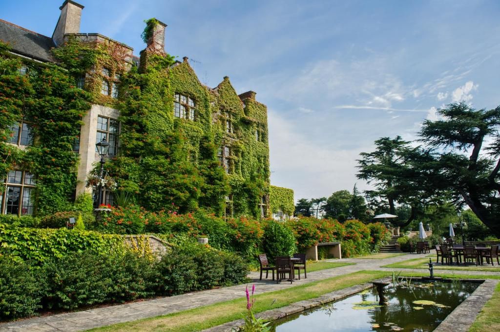 <p>The luxurious <a href="https://www.booking.com/hotel/gb/pennyhillhotel.en-gb.html?aid=2070929&label=weekend-trips-from-london">Pennyhill Park</a> sits in a grand 18th-century manor, with a spa and a four AA Rosette restaurant headed by Michelin-starred chef Steve Smith. You can swim to the sound of underwater music in one of the spa’s eight pools, and sip Champagne in the outdoor tub -waiters are on hand to serve drinks in and around the pools. </p><p>You'll also want to enjoy a superb dinner in The Latymer restaurant and learn about the provenance of the artistically presented dishes</p><p><a href="https://www.redescapes.com/offers/surrey-bagshot-pennyhill-park"><em>Read our review of Pennyhill Park</em></a></p><p><a class="body-btn-link" href="https://www.booking.com/hotel/gb/pennyhillhotel.en-gb.html?aid=2070929&label=weekend-trips-from-london">CHECK AVAILABILITY</a></p>