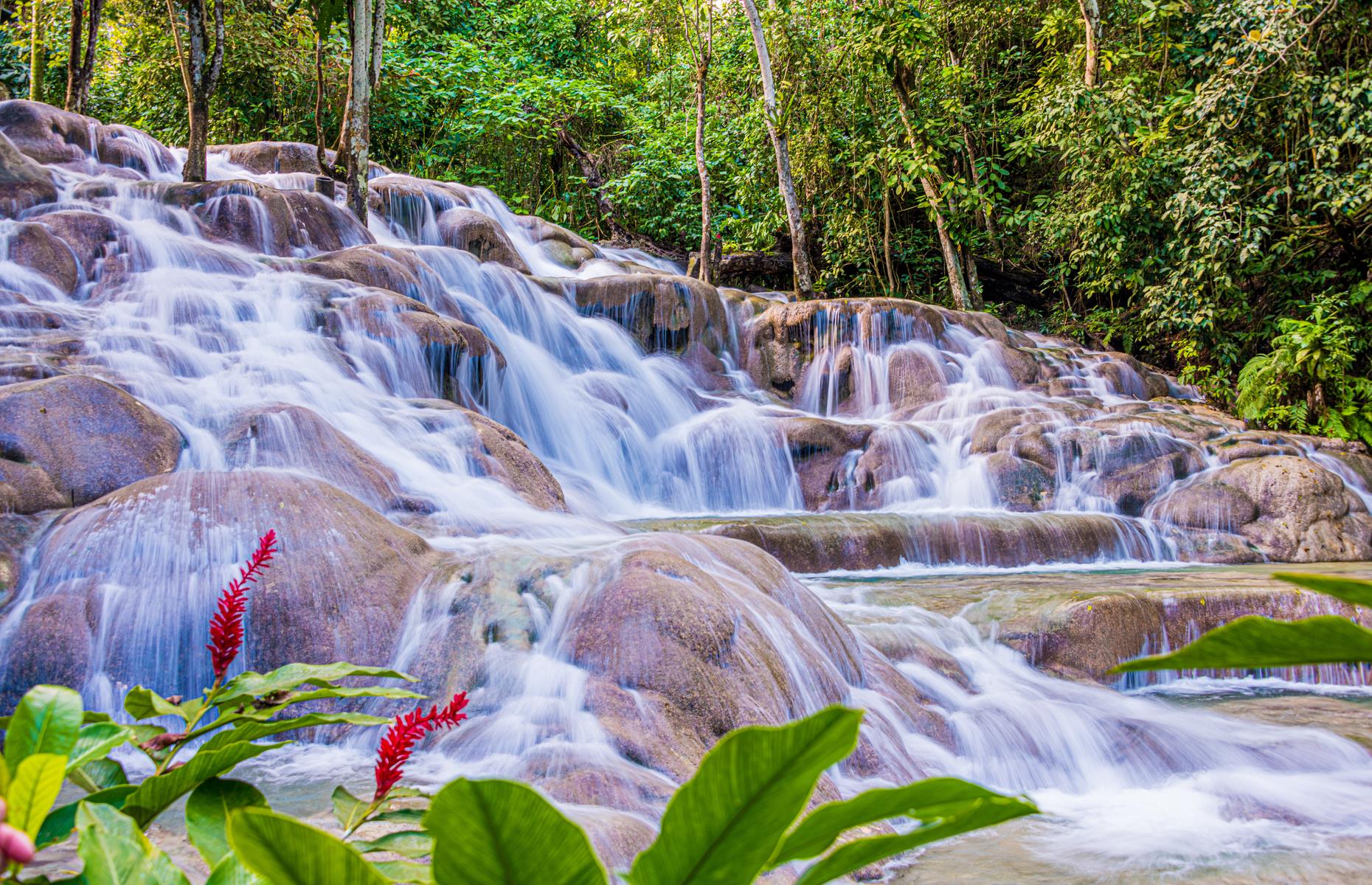 <p>The Dunns River Falls, spectacular rock pools and cascades that tumble down to the sea near Ocho Rios, are one of the country’s most popular sights and famously featured in <em>Dr No</em> as part of the fictional Crab Key Island. So did vibrant capital Kingston, where Sean Connery filmed several scenes including at the Governor General’s mansion, King’s House. Away from the Bond connections, the island entrances with its jungle-clad Blue Mountains, plethora of palm-studded beaches, cool music scene, fantastic food and hip hotels. It’s no wonder the super sleuth keeps coming back – the tropical island also makes an appearance in the latest 007 installment.</p>