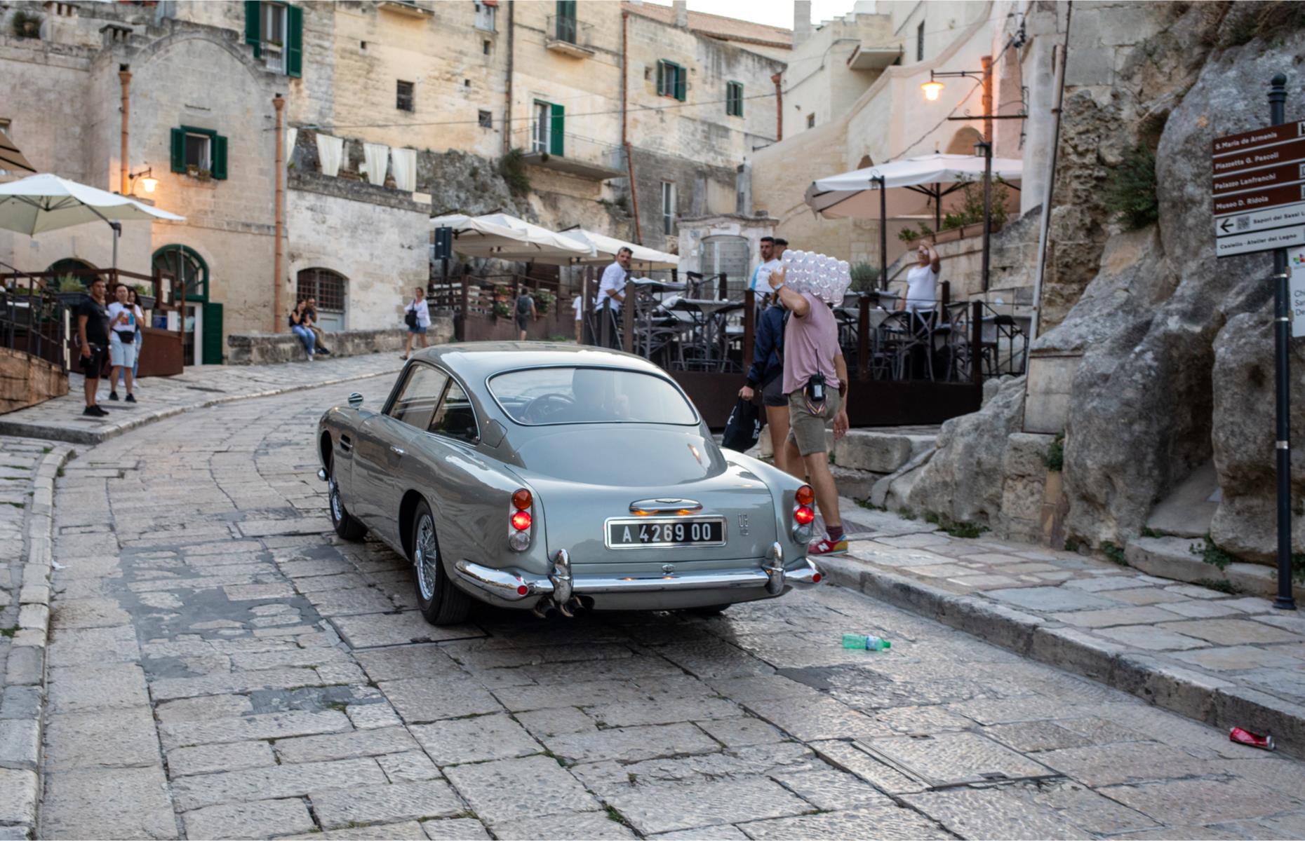 <p>The UNESCO World Heritage Site is the setting for a high-speed car chase scene, naturally featuring the secret agent’s Aston Martin (pictured here during filming). Matera's 13th-century Romanesque cathedral and sassi districts are a spectacular backdrop. The Sasso Caveoso and Sasso Barisano quarters were once makeshift homes for the town’s underprivileged: now these age-old dwellings house restaurants, bars and hotels, including the charming <a href="https://www.sextantio.it/en/legrottedellacivita/matera/">Sextantio Le Grotte della Civita</a>. There are also more than 100 rock-hewn churches including the largest, 12th-century Chiesa San Pietro Barisano.</p>  <p><a href="https://www.loveexploring.com/gallerylist/73233/filming-movie-locations-usa"><strong>Now check out the most famous movie locations in every US state</strong></a></p>