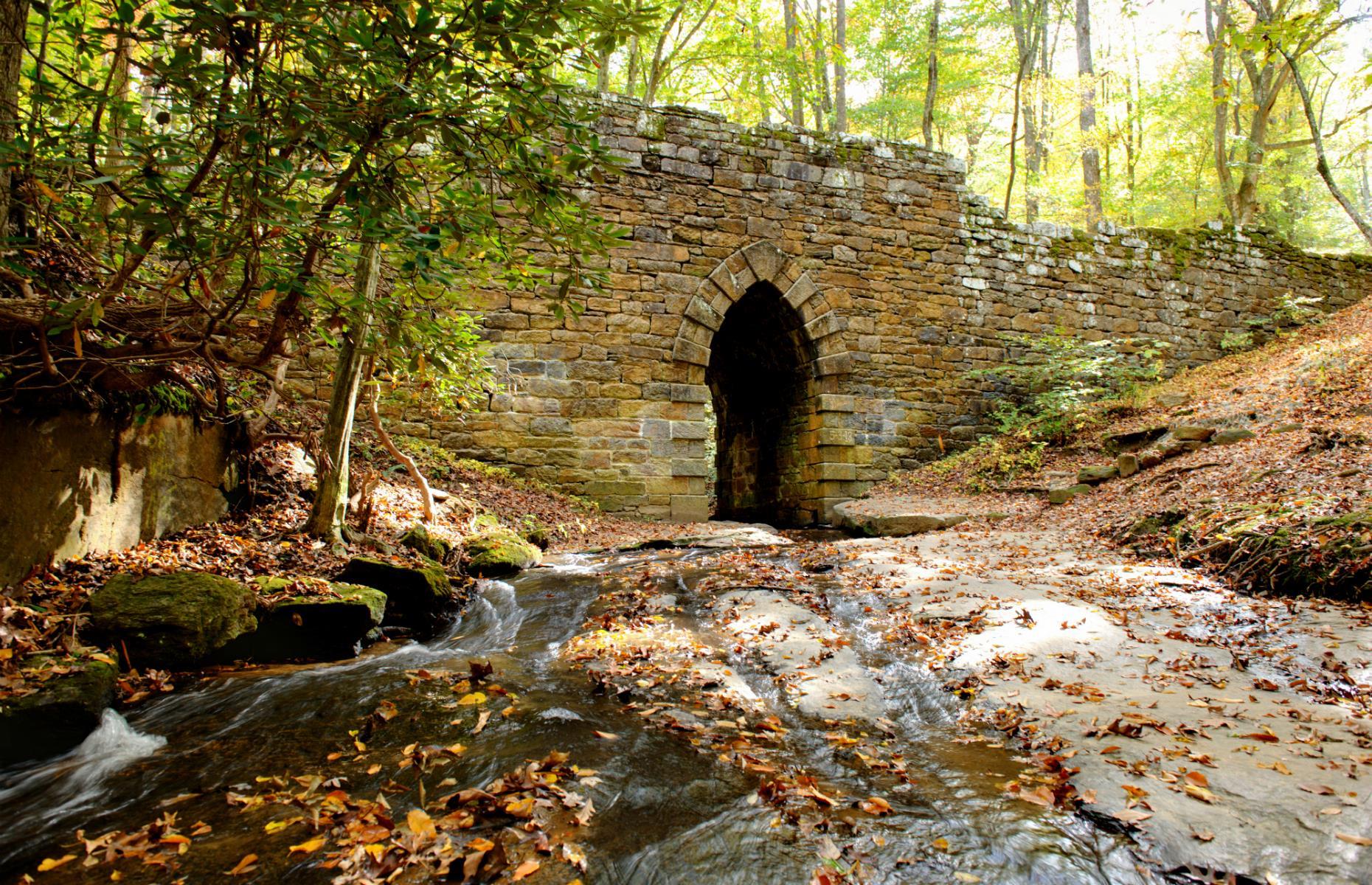 <p>This quaint stone bridge might not seem very sinister at first – especially when compared to the foreboding 19th-century mansions and creaking ghost towns scattered across the States. But the unassuming structure is said to be a magnet for spirits. Many visitors have reported feeling a strange presence here and one ghost hunter even claims to have seen a pair of shining orbs hovering near it. </p>