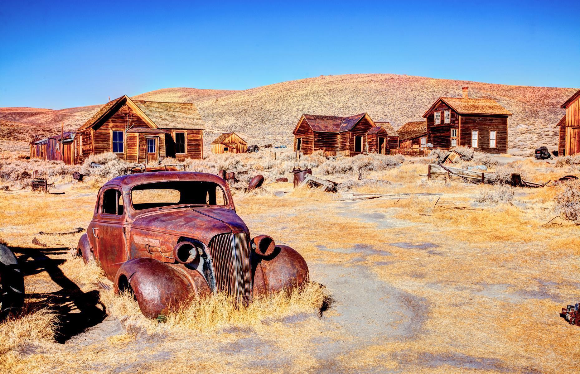 <p>The bones of <a href="https://www.parks.ca.gov/?page_id=509">Bodie</a>, a gold-mining town that thrived in the late 19th century, are scattered across the desert. In its heyday, the town was home to some 10,000 people and, though residents spilled out when gold resources dwindled, legend has it that Bodie was never entirely abandoned. Today it's a ghost town by name and by nature, with reports of haunting faces appearing at windows and of cooking smells hanging in the air.</p>