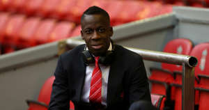 Aly Cissokho wearing a suit and tie: Aly Cissokho of Liverpool