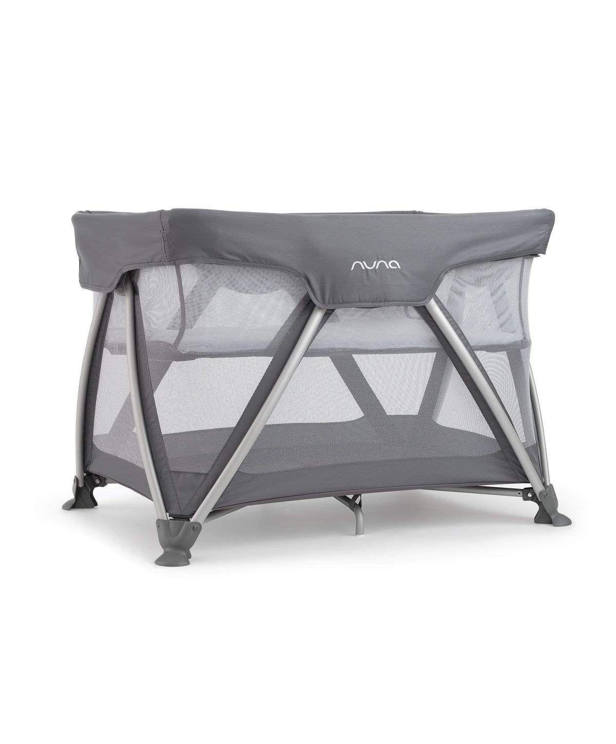 <p><strong>£170.00</strong></p><p><a href="https://www.mamasandpapas.com/products/nuna-sena-travel-cot-graphite-173347700">Shop Now</a></p><p>At 14.95kg this travel cot from Dutch baby brand Nuna is at the heavier end of the portable scale. But our panel of mum testers were impressed with the handy centralised pulley system that can be assembled in seconds with no tools required, plus it’s raised off the ground to increase airflow and keep your baby cool throughout the night. It also folds up small enough to store away easily in a cupboard and most importantly, the padded mattress was cosy enough to get the little one's vote. </p><p>Pop this cute <a href="https://www.mamasandpapas.com/products/snuz-cloud-baby-sleep-aid-282846800">Baby Snuz Cloud</a> in your shopping trolley too and boost everyone's chances of a good night's sleep.</p><p><strong>Dimensions</strong>: 74.5cm x 107cm x 73.5cm</p><p><strong>Folded size</strong>: 85.5cm x 36.5cm x 34 cm</p><p><strong>Weight</strong>: 14.95kg</p>