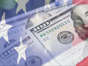Composite design of the American Flag and cash money to depict the Stimulus checks Americans received during the COVID-19 crisis.