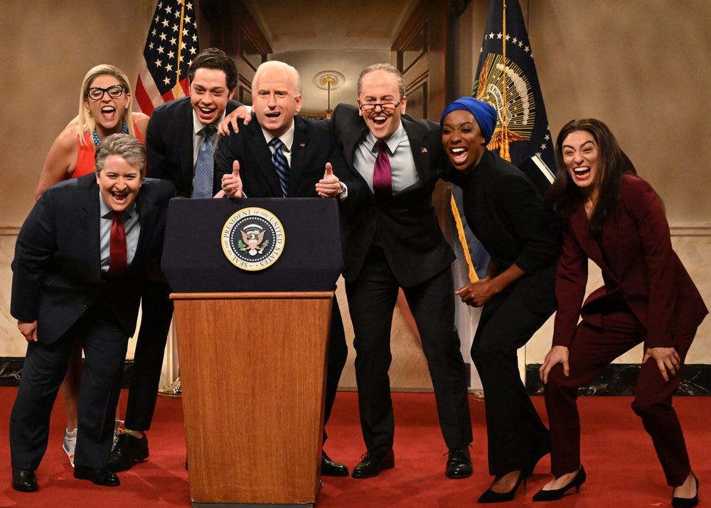 Slide 3 of 11: Davidson also acted as Andrew Cuomo in the Oct. 2 "SNL." The skit was also helmed by Aidy Bryant as Sen. Joe Manchin, Cecily Strong as Sen Krysten Sinema, James Austin Johnson as President Joe Biden, Alex Moffat as Sen. Chuck Schumer, Ego Nwodim as Rep. Ilhan Omar and Melissa Villaseñor as Rep Alexandria Ocasio-Cortez.