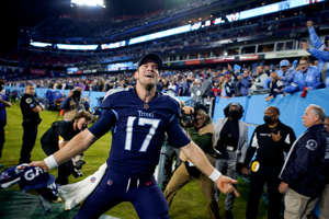 Tennessee Titans quarterback Ryan Tannehill (17) celebrates with fans as he leaves the field after beating the Bills at Nissan Stadium Monday, Oct. 18, 2021 in Nashville, Tenn.