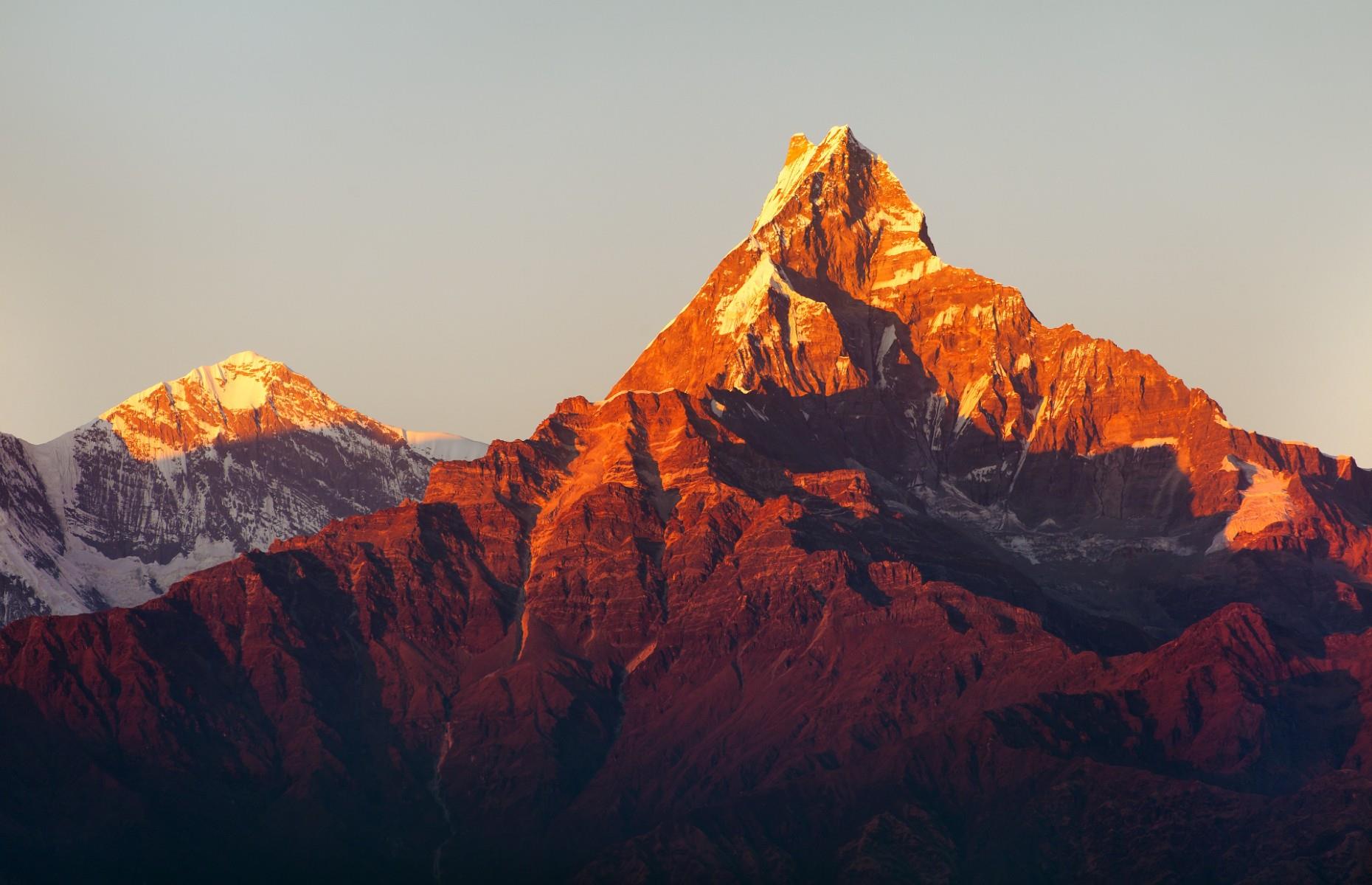 <p>At 22,943 feet (6,993m) tall, it’s not up there with the Himalayas’ big hitters, but Machhapuchhare could be its most elusive peak. Located in north-central Nepal, the stunning, fishtail-shaped mountain has never been summited. That’s due to <a href="https://www.bbc.com/travel/article/20210216-the-himalayan-peak-off-limits-to-climbers">British army officer Jimmy Roberts</a>, who attempted an expedition up Machhapuchhare in 1957, but had to turn back due to bad weather. Bizarrely, Roberts made the request to ban all climbing on the mountain and the Nepali government obliged. It’s also regarded as sacred by the Gurung people who live in the village of Chomrong nearby.</p>