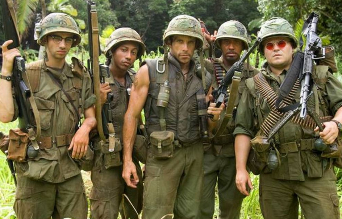 <p>2008’s <strong>Tropic Thunder</strong> stars Ben Stiller, Jack Black, Robert Downey Jr., Jay Baruchel, and Tom Cruise as oblivious to reality actors and producers who set out to make a Vietnam War film in a real-life jungle. Unbeknown to the actors, who are in character during the whole process, is that they were dropped in the middle of a heroin-producing area which starts a chain of events that are pure gold. The film deals with the stupidity of Hollywood and their often-surreal takes and opinions on issues of current events and race. Tom Cruise is out of this world as Les Grossman, an ill-tempered studio executive.</p>
