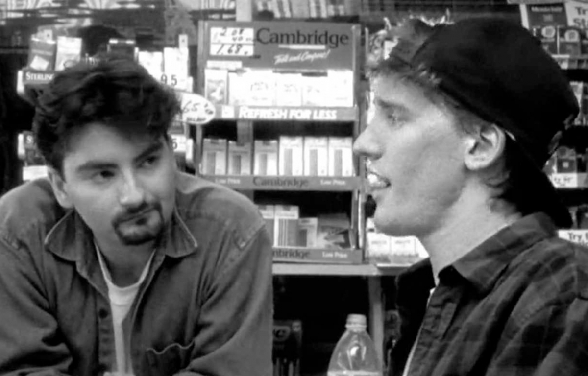 <p>In 1994 a young director named Kevin Smith came on to the scene with a funny and inspiring black and white comedy movie called <strong>Clerks</strong>. The film centers around two bored 20 something slacker generation store employees and their lack of sensibility towards their customers. The film has some truly funny scenes, like the two leads closing the store to play hockey on the roof, but what is truly groundbreaking about this movie is that it inspires young filmmakers that with a camera and some good friends you can make a movie. Smith does a great job of making the audience feel like we spent a day with Dante and Randal.</p>