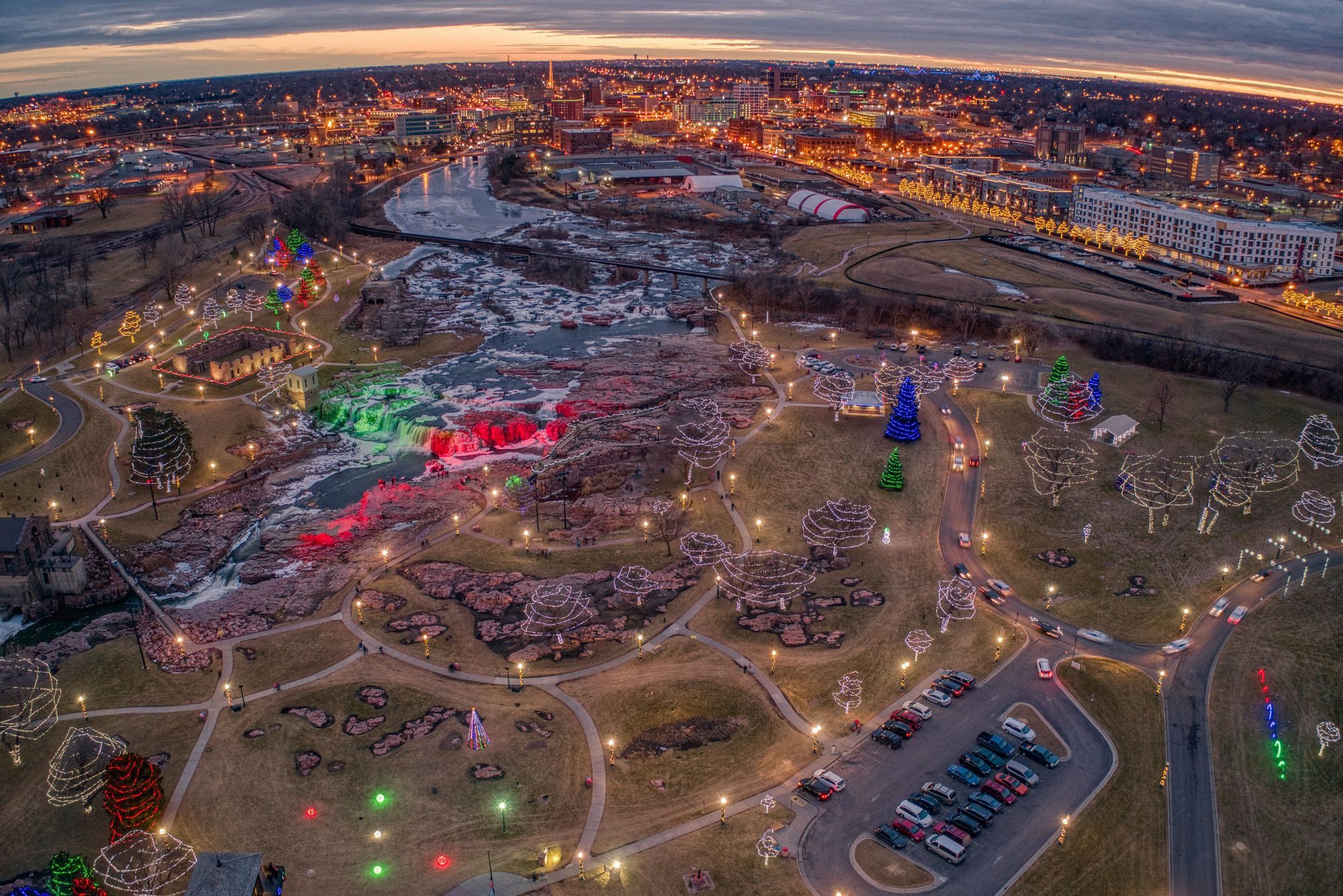 <p><strong>Best for:</strong> Waterfall chasers</p> <p>Gorgeous waterfalls of tumbling icy water in the Big Sioux River illuminated by over 355,000 colored lights is the highlight of the Christmas season in Falls Park—a Winter Wonderland fit for Santa himself. But that's not all the city has to offer: Downtown Sioux Falls also gets the holiday decorating treatment with a Parade of Lights and tree lighting, the town's thriving entertainment scene offers holiday musical and stage performances. There are plenty of outdoor winter activities in the area as well, including skiing, snow tubing, snowshoeing, and ice skating.</p> <p>A stay downtown at Hotel on Phillips allows visitors to walk to many area holiday attractions, bars, and restaurants and offers amazing views over the river. The hotel, which features an art deco style, plays up the building's history as an early 1900s bank with the original 16-ton vault door as the entrance to the lounge.</p> <p class="listicle-page__cta-button-shop"><a class="shop-btn" href="https://www.tripadvisor.com/Hotel_Review-g54805-d17761445-Reviews-Hotel_on_Phillips-Sioux_Falls_South_Dakota.html#REVIEWS">Book Now</a></p>