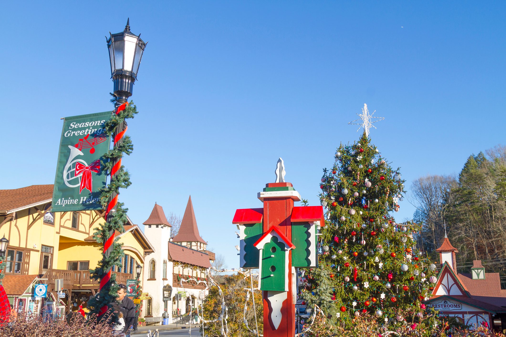 <p><strong>Best for:</strong> A Bavarian Christmas</p> <p>Pretend you're in the Alps instead of the Blue Ridge Mountains in this adorable German-influenced Christmas town, one of the most picturesque <a href="https://www.rd.com/list/most-european-cities-in-america/">small American towns you'd swear were from Europe</a>. As if it doesn't look storybook enough, in December it becomes a holiday paradise with its Christkindlmarkt, or Christmas market, with unique gifts, decorations, yummy food, drinks, and candied treats. Plus, the annual lighting of the village has Santa and Mrs. Claus arriving on a Bavarian sleigh to greet children as the town is lit up, plus musical performances.</p> <p>The quirky Heidi Motel is one of the only places in the country you can stay in a windmill! With recently updated rooms, in-room jacuzzis, and close to the center of town, this motel will make for a memorable stay.</p> <p class="listicle-page__cta-button-shop"><a class="shop-btn" href="https://www.tripadvisor.com/Hotel_Review-g35004-d610539-Reviews-or10-Heidi_Motel-Helen_Georgia.html#REVIEWS">Book Now</a></p>