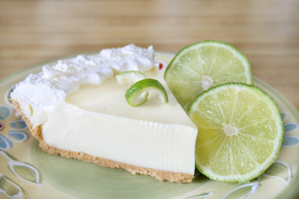 <p>According to <a href="https://www.foodandwine.com/news/key-lime-pie-origins-debate-stella-parks-bravetart">Food and Wine</a>, the Sunshine State is the place to go for an authentic slice of key lime pie.</p><p>Although debate continues over where the dessert was invented, many trace its origins to Key West. <a href="https://gothamist.com/food/key-lime-pie-the-state-pie-of-florida-may-have-originated-in-nyc">According to Gothamist</a>, it could have originated <a href="https://www.insider.com/surprising-things-from-train-trip-60-hours-new-york-texas-amtrak-2021">in New York City</a> — nevertheless, the recipe is pretty universal.</p><p>To make it, bake a graham crust, pack it with lime filling, and top it all off with an airy meringue.</p>