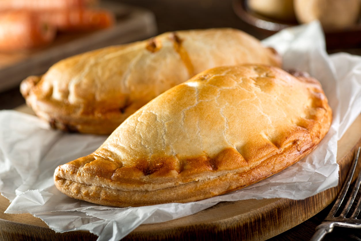 <p><a href="https://www.historic-uk.com/CultureUK/The-Cornish-Pasty/">According to Historic UK</a>, these hearty pies hail from Cornwall and are usually filled with beef, potato, swede, and onion. Historically, they were eaten by miners and farm workers in this region as they worked.</p><p>They're typically seasoned with salt and pepper and baked in a distinctive half-circle shape.</p>