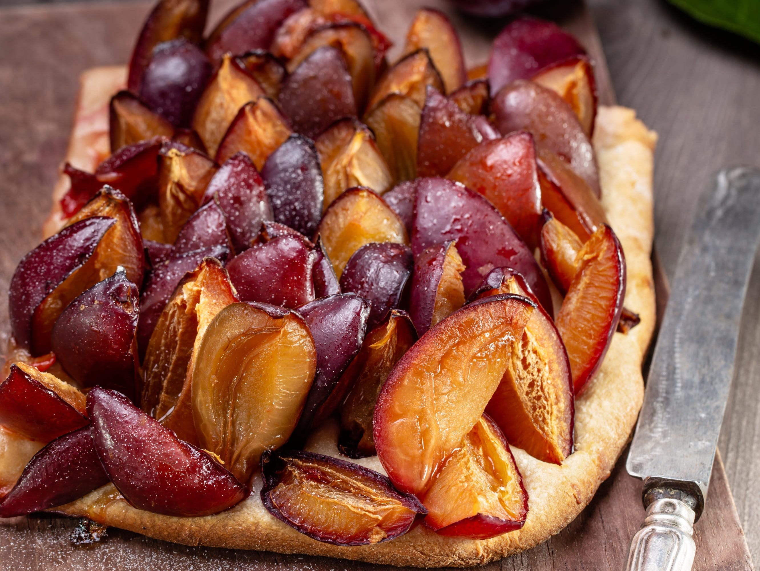 <p>If you're <a href="https://www.insider.com/fruits-around-the-world-2018-7">a fan of plums</a>, you'll love this German pastry.</p><p><a href="https://www.theguardian.com/food/2018/sep/05/how-to-make-the-perfect-german-plum-cake">According to The Guardian</a>, zwetschgenkuchen (also known as quetschekuche, pflaumenkuchen, or zwetschgendatschi<em>) </em>is best made with either yeasted dough or shortcrust pastry, covered with small, pitted Italian plums.</p><p><a href="https://www.daringgourmet.com/zwetschgenkuchen-zwetschgendatschi-german-plum-cake/">According to Daring Gourmet</a>, some recipes also call for a sprinkling of streusel on top — a twist on the original recipe.</p>