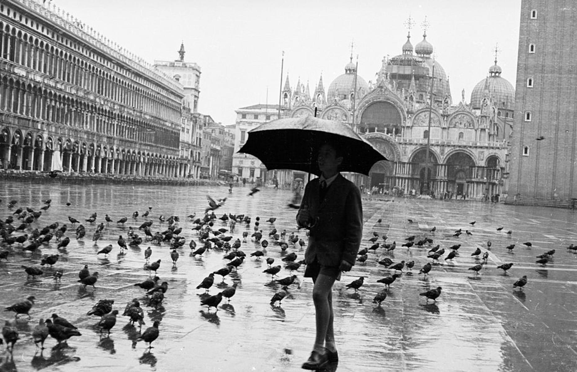 <p>Venice experienced serious flooding in the 1960s and this picture, taken in 1958 in St Mark’s Square, seems to presage that event. Since that time, the number of tourists has grown year on year. The arrival of enormous cruise ships into the harbor dwarfed the city and its beautiful architecture. They were only <a href="https://www.bbc.co.uk/news/world-europe-56592109">banned in 2021</a>. During pandemic lockdowns, dolphins returned to the harbor, but the lack of tourists was financially disastrous for the city.</p>  <p><a href="https://www.loveexploring.com/galleries/96018/incredible-images-that-show-how-the-earth-is-healing-during-coronavirus?page=1"><strong>Incredible images show how the Earth began to heal during the pandemic</strong></a></p>