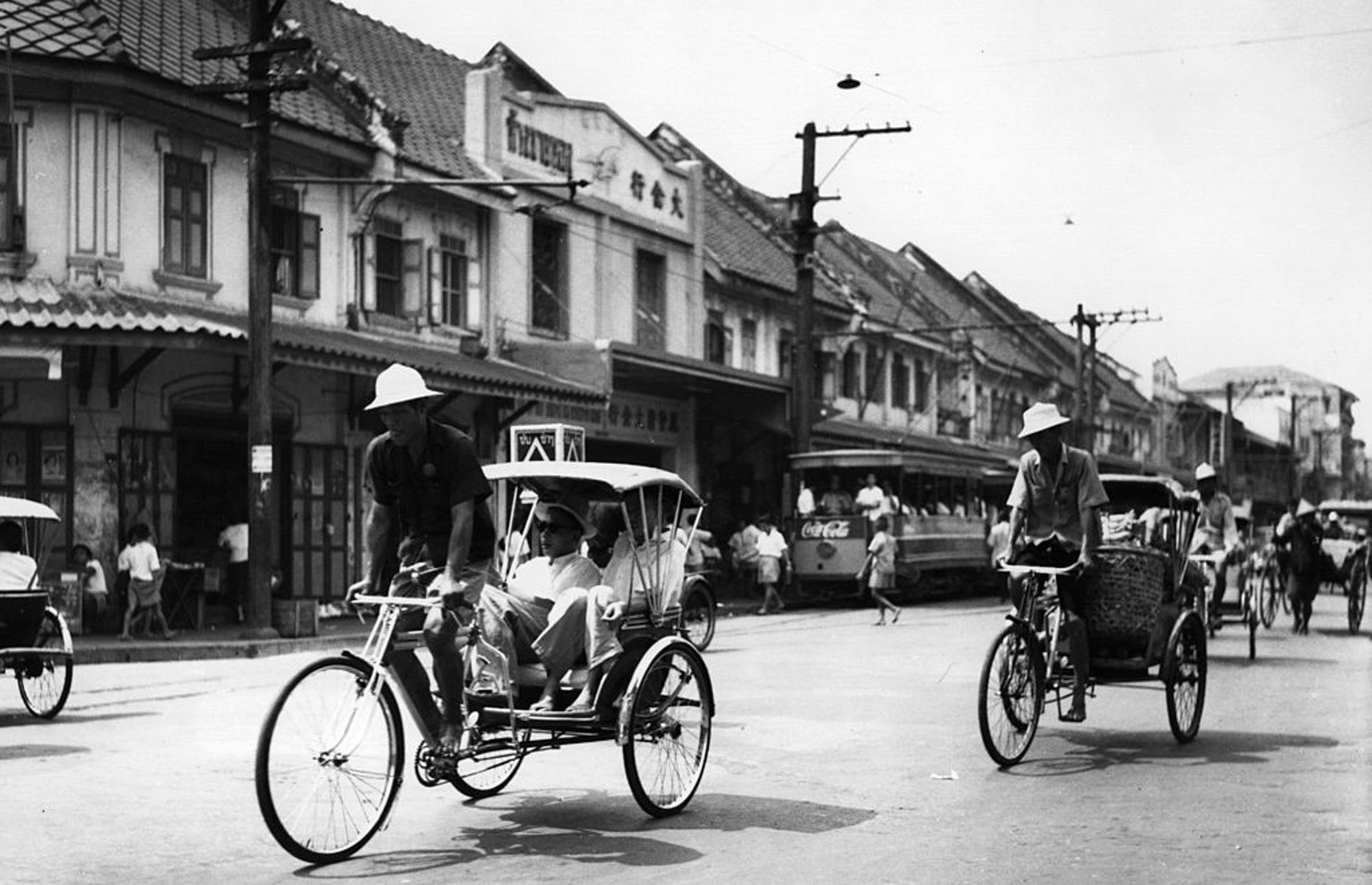As the country sided with Japan in the Second World War, it was heavily bombed, but received American aid afterwards. The economy grew and during the 1950s, tourism to the city increased. These pedal-powered rickshaws were then a very common means of transport, and this Fifties snap shows a scene worlds away from the modern metropolis we're now familiar with.